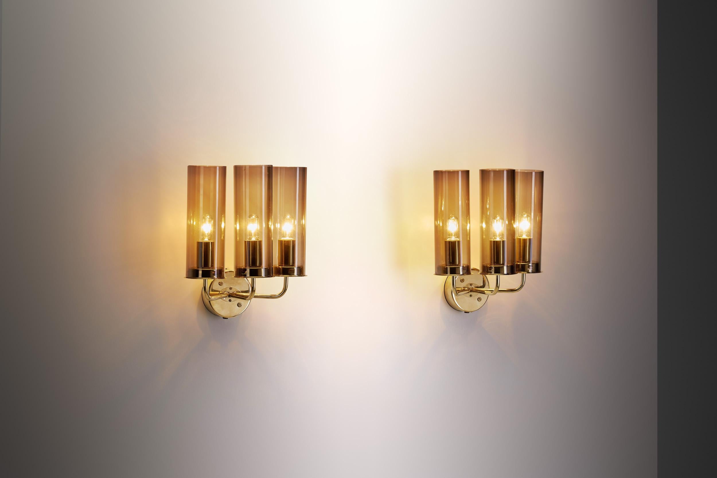 While Hans-Agne Jakobsson designed and produced various types of furniture, his lighting received greater international attention, not without a good reason. As these “V-169/3” wall sconces showcase, the Swedish designer mastered both the direction