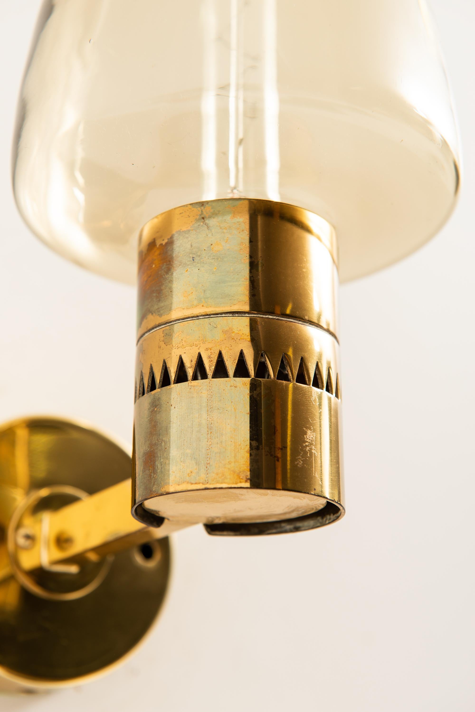 Wall lamps model V-220 designed by Hans-Agne Jakobsson. Produced by Hans-Agne Jakobsson in Markaryd, Sweden.