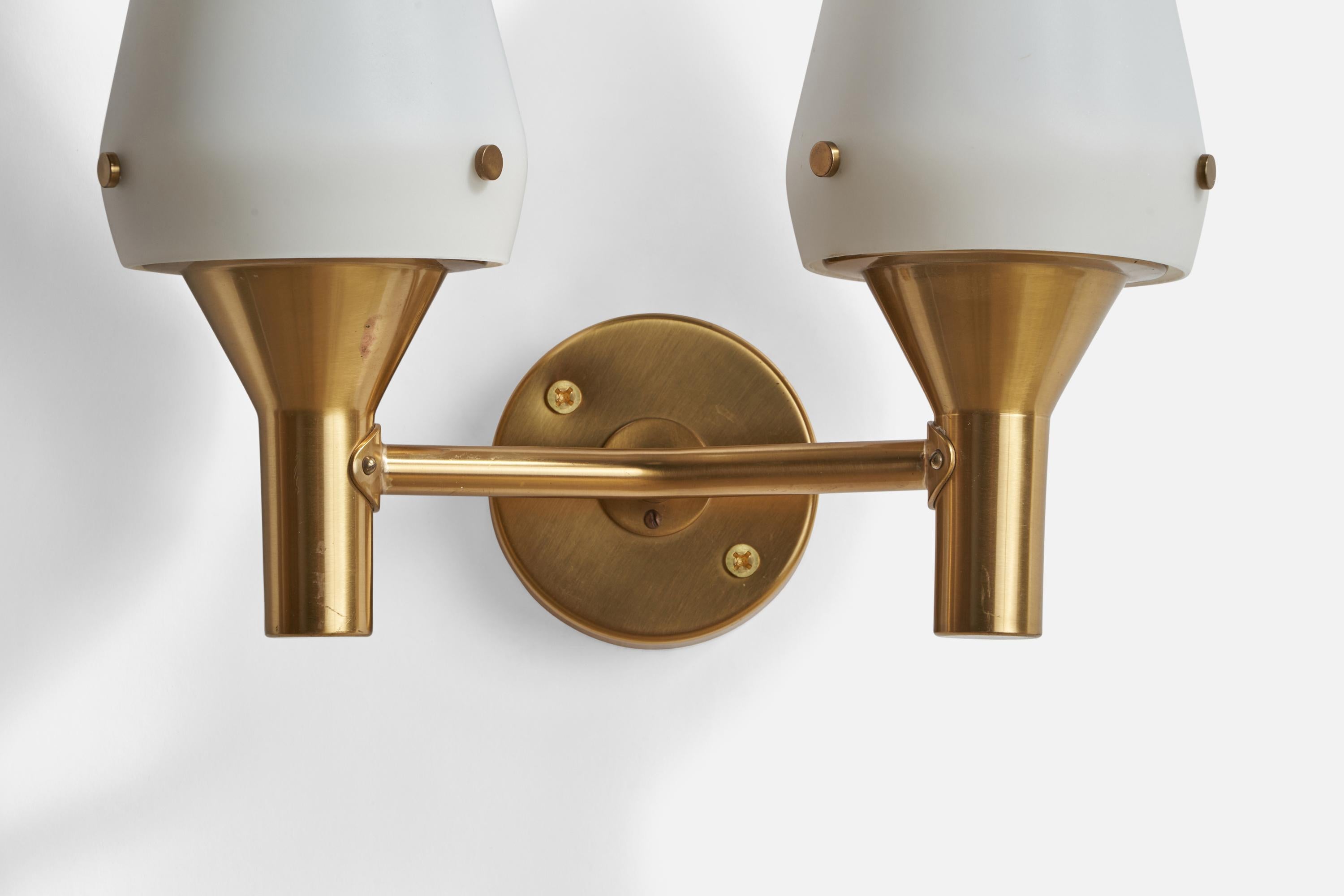 A two-armed brass and opaline glass wall light designed and produced by Hans-Agne Jakobsson, Markaryd, Sweden, 1960s.

Overall Dimensions (inches): 13” H x 13” W x 6.9” D
Back Plate Dimensions (inches): 4.25” Diameter x 1.75” Depth
Bulb