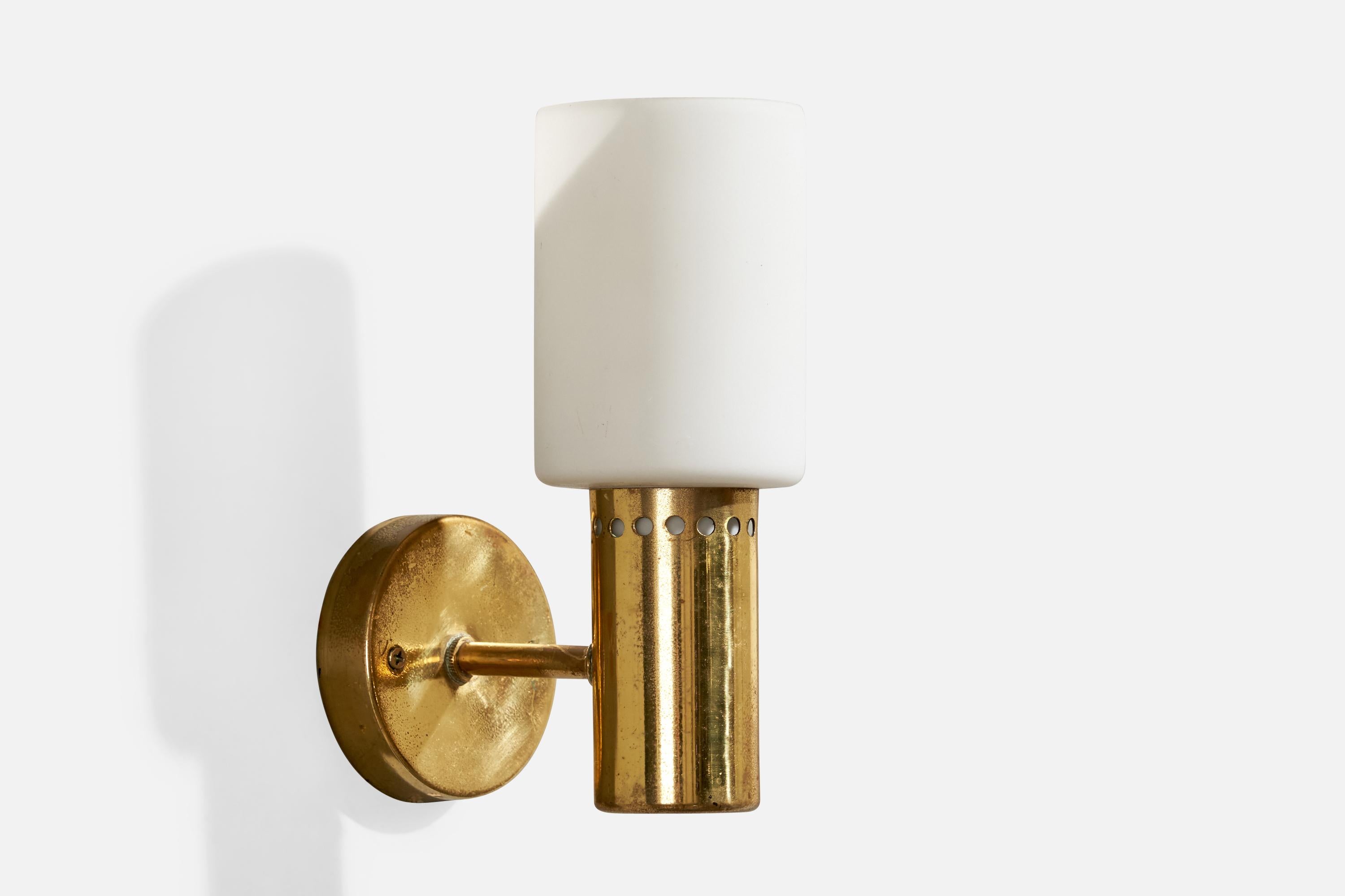 A brass and white opaline glass wall light designed and produced by Hans-Agne Jakobsson, Sweden, c. 1960s.

Overall Dimensions (inches):  8.5” H x  5.25” W x  6.25“D

Back Plate Dimensions (Inches):  3.25” H x 3.25” W x .875” D

Bulb Specifications: