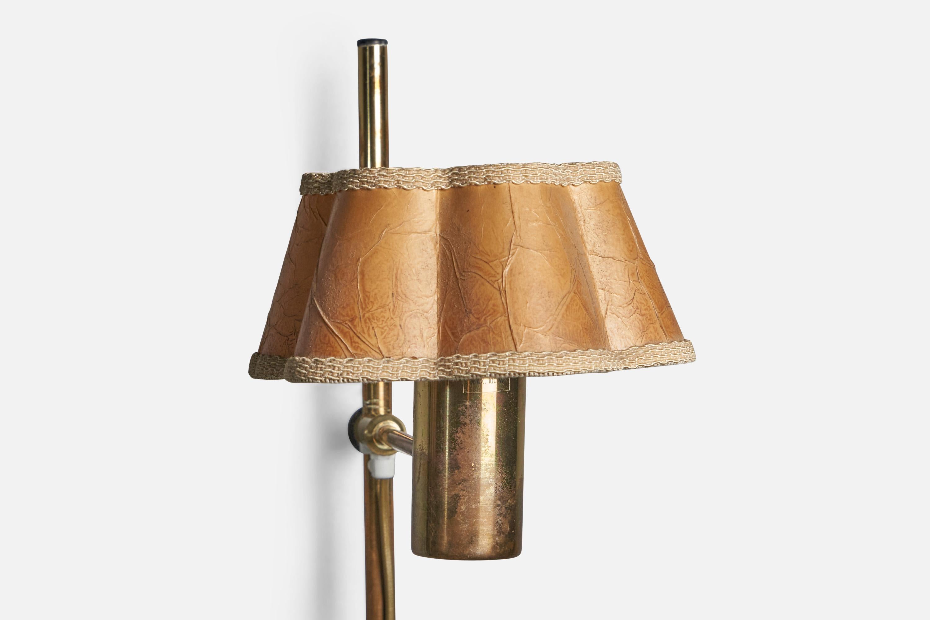 A brass and beige paper wall light, designed and produced by Hans-Agne Jakobsson, Markaryd, Sweden, 1970s. 

Please note cord feeds from stem connected directly to light source.
Overall Dimensions (inches): 19