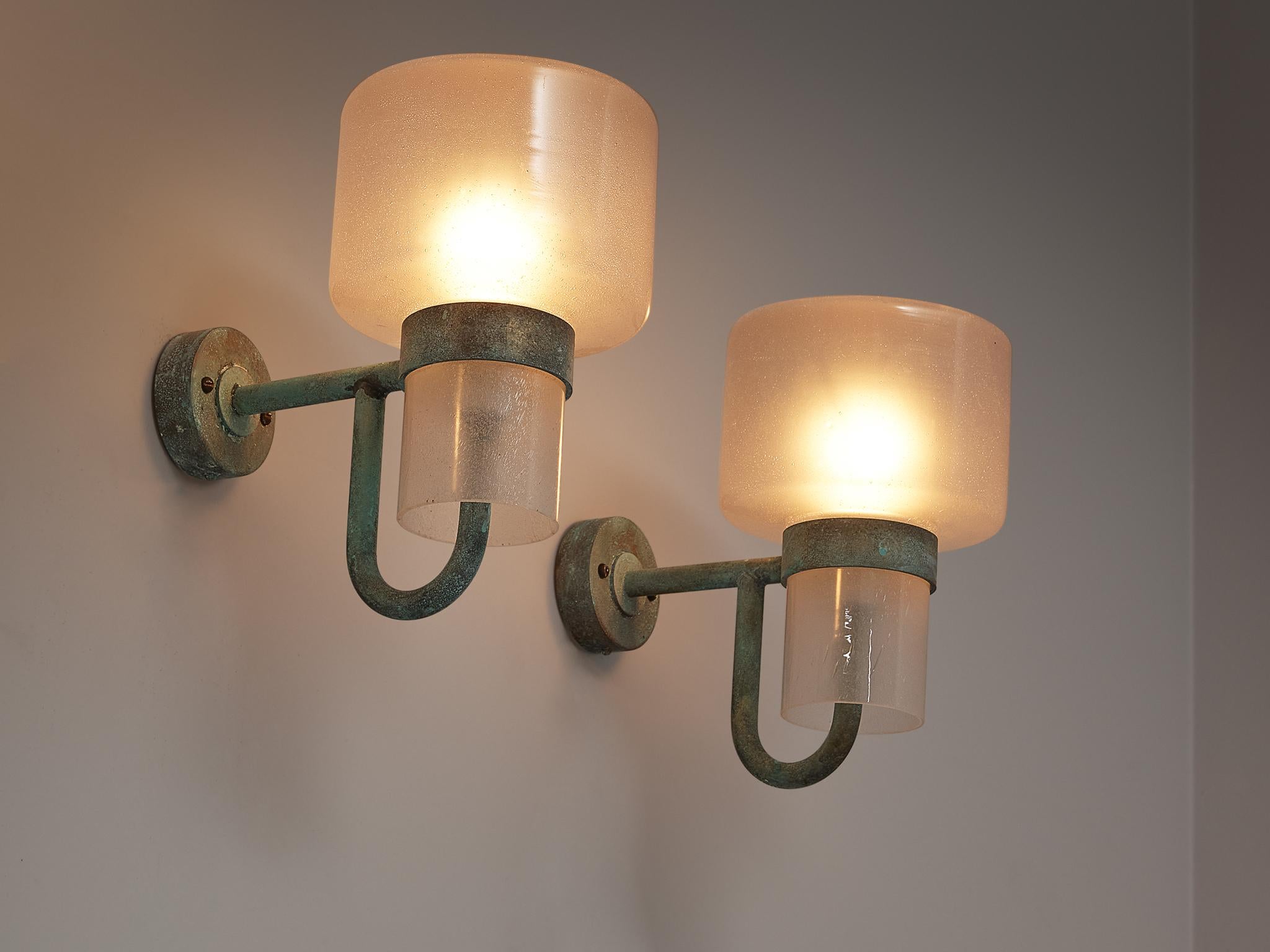 Hans-Agne Jakobsson, produced in AB Markaryd, wall light, model 138, copper and opaline glass, Sweden, 1960s.

Charming wall lights executed in copper with an opaline glass shade designed by Hans-Agne Jakobsson. These scones feature a modest copper