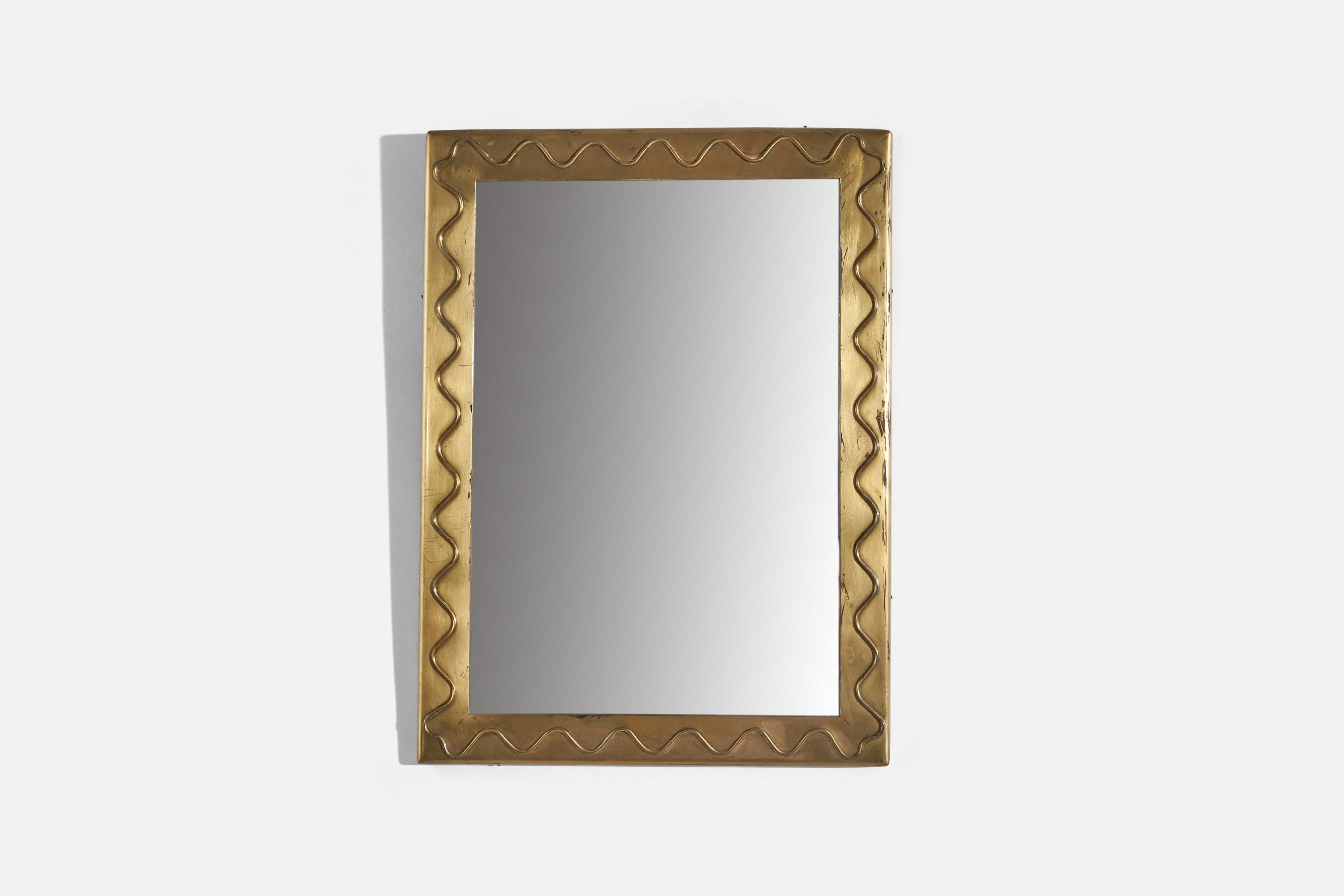 A brass wall mirror designed and produced by Hans-Agne Jakobsson, Sweden, 1960s. With makers label.