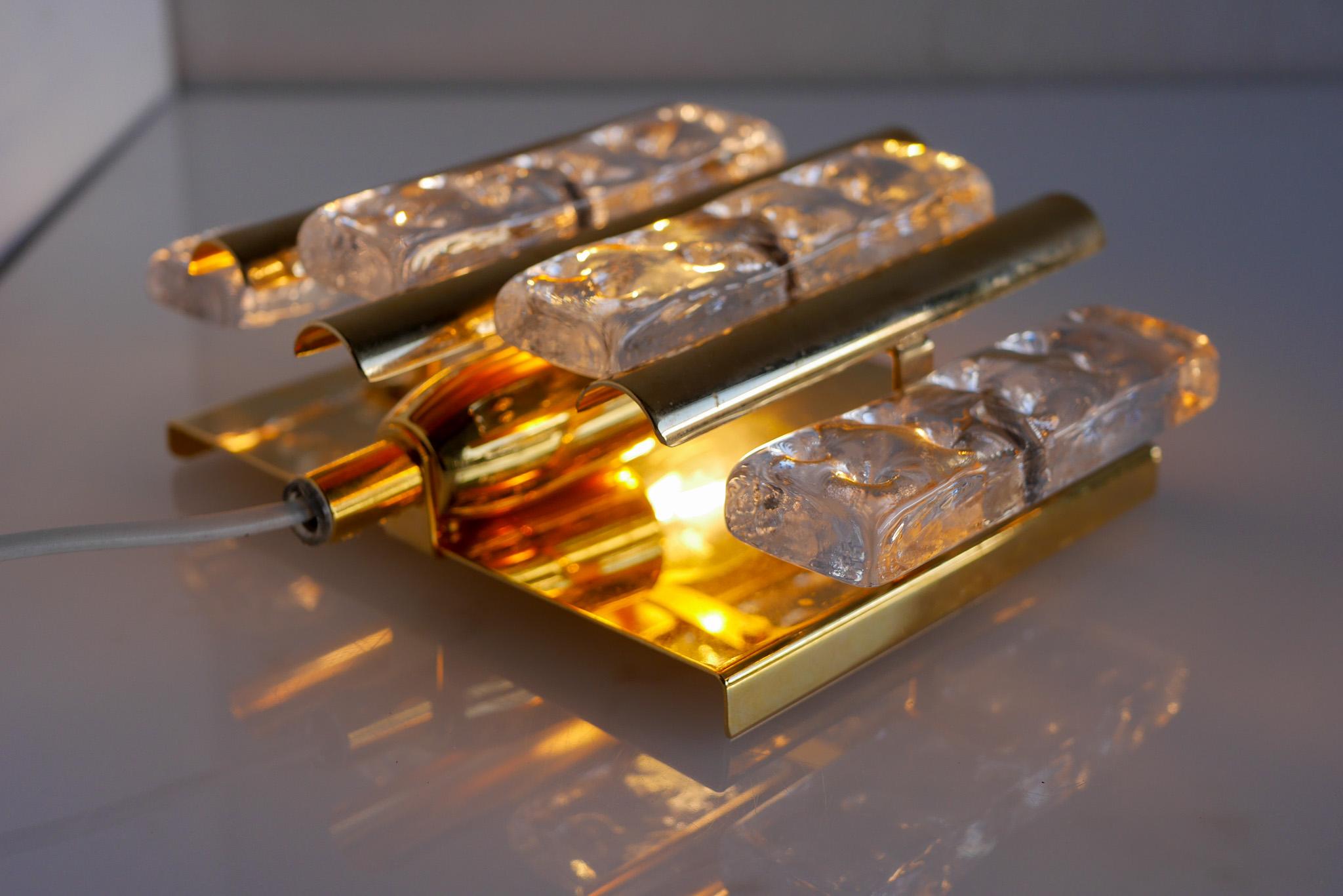 Brass Hans-Agne Jakobsson wall mounted sconce, a fantastic glass and brass lamp For Sale