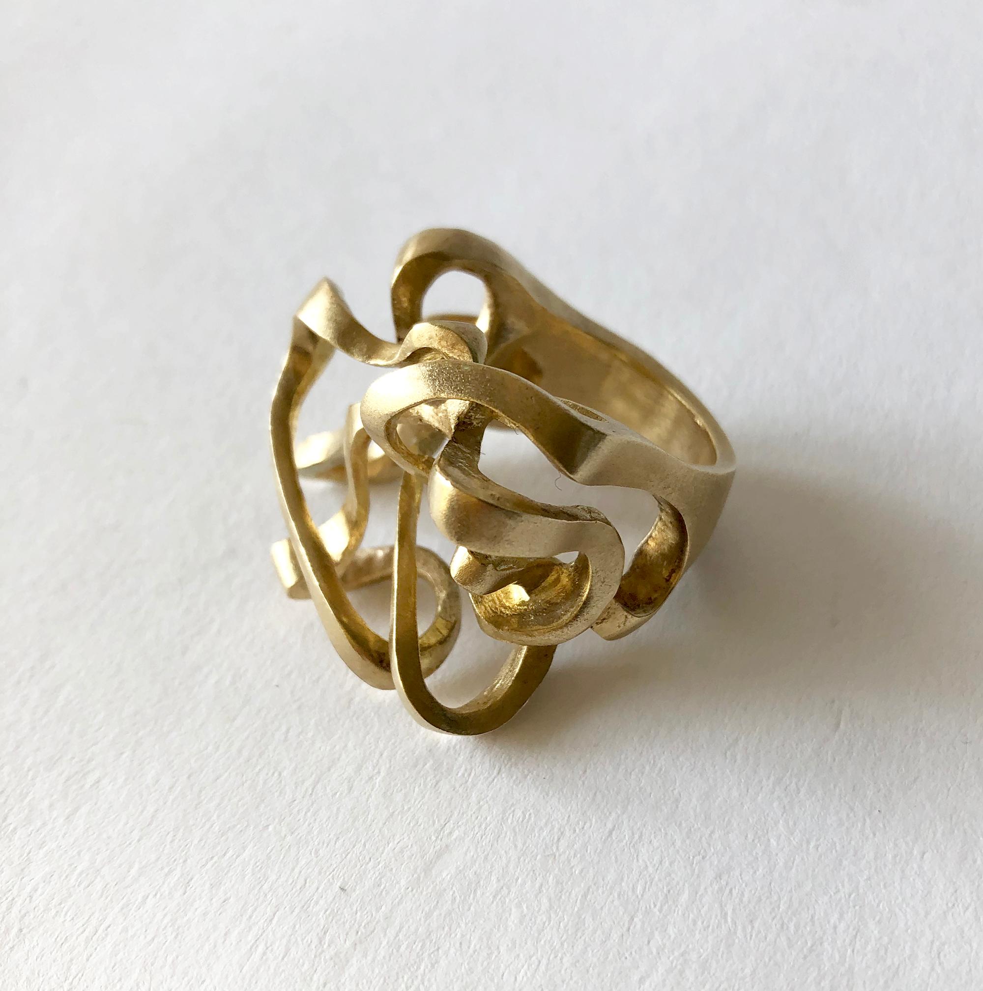 Postmodernist 14K gold sculptural ring created by Hans Appenzeller of Amsterdam, circa 2000. Ring is a finger size 7.75 - 8 and is signed with the 585 hallmark for gold content.  In very good vintage condition.  34.1 grams.


After his training at