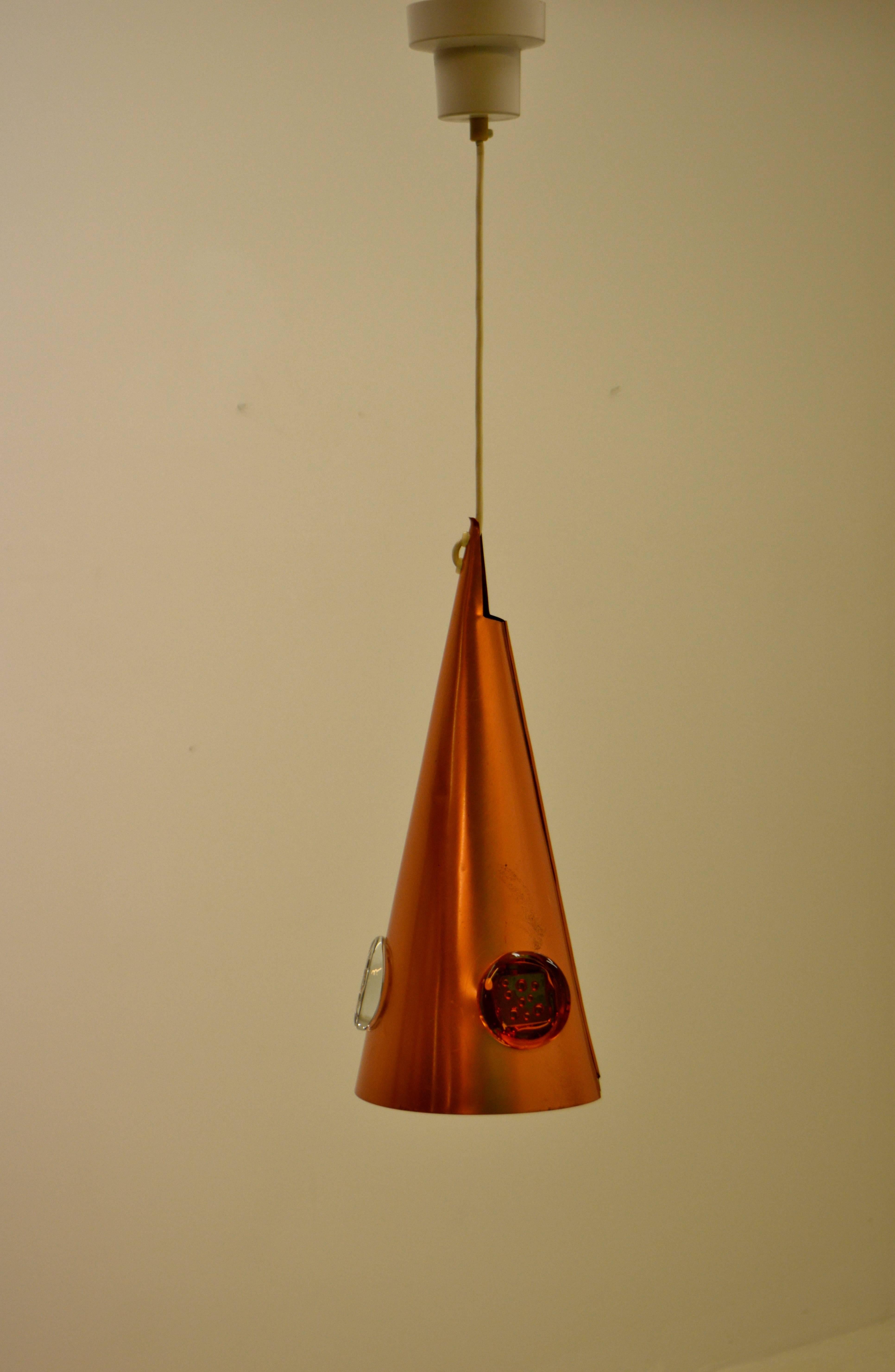 A collaboration between the two Swedish designers Erik Höglund and Hans Bergström resulted in this copper and glass lamp.
Height below is given with cord cluded.