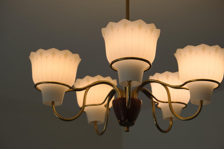 Swedish Hans Bergström Five Arm Chandelier in Brass, Wood and Glass, ASEA, Sweden, 1950s For Sale