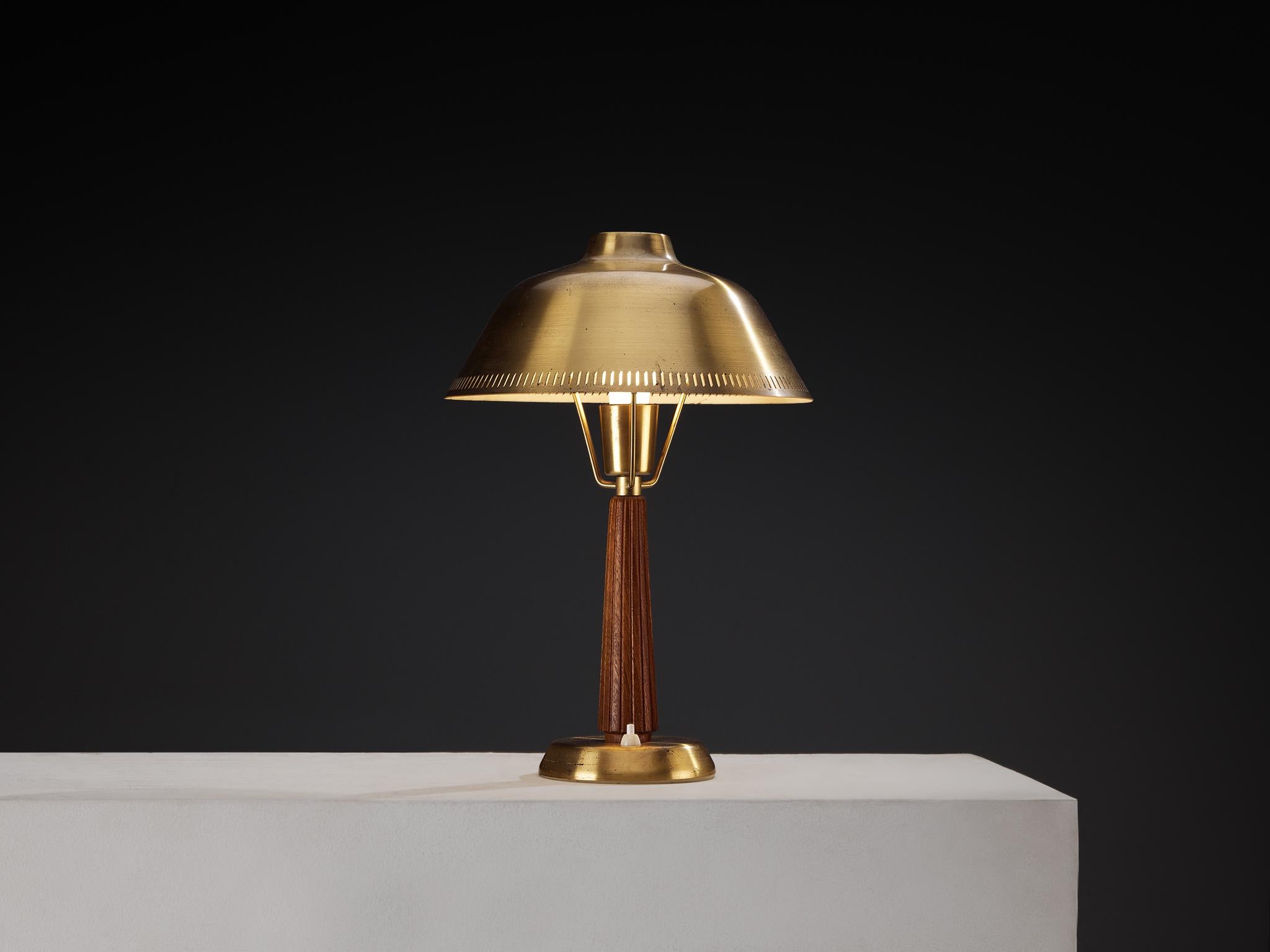 Hans Bergström for ASEA, table lamp, mahogany, brass, Sweden, 1950s

This lovely table lamp is designed by Hans Bergström for ASEA in the 1950s, and is a beautiful example of Scandinavian Modern design. Made in rich and dark mahogany wood and brass,