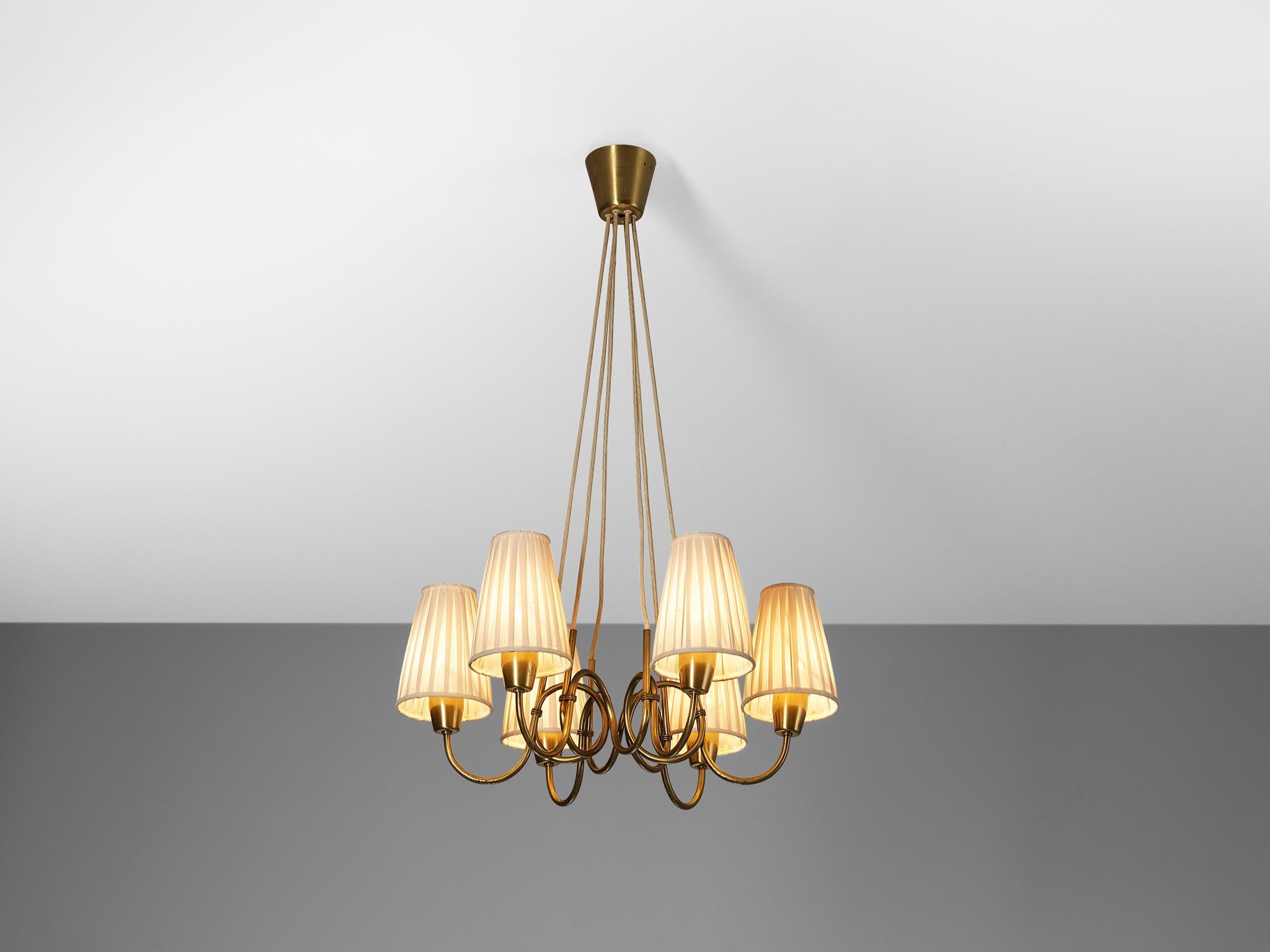 Hans Bergström for Ateljé Lyktan, chandelier, model no. 7 ‘Grisarumpan’, brass, fabric, Sweden, 1934-1940

This wonderful early chandelier was designed by renowned Swedish architect and design Hans Bergström in the second half of the 1930s for his