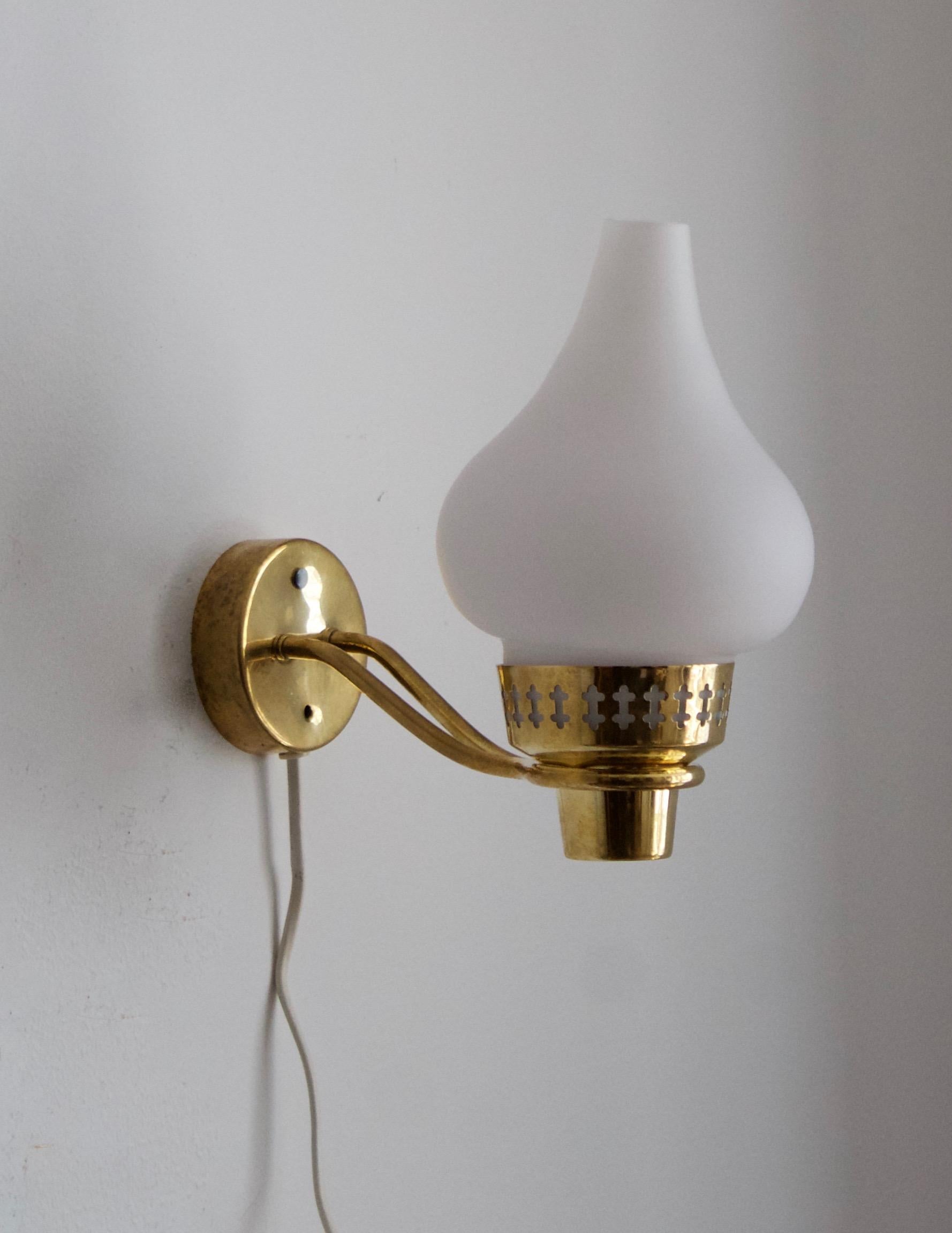 A wall light / sconce produced by Swedish Ateljé Lyktan, designed by Hans Bergström. Produced in brass, assorted vintage rattan lampshades.

Other Nordic lighting designers include Paavo Tynell, Hans-Agne Jacobson, Carl-Axel Acking, and Alvar