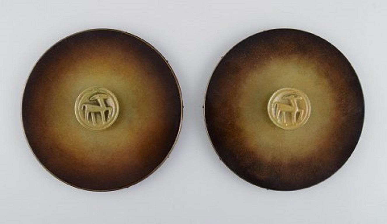 Hans Bergström for Ystad Brons. A pair of Art Deco hand mirrors in bronze, 1940s.
Measure: Diameter: 15 cm.
In excellent condition.
Stamped.