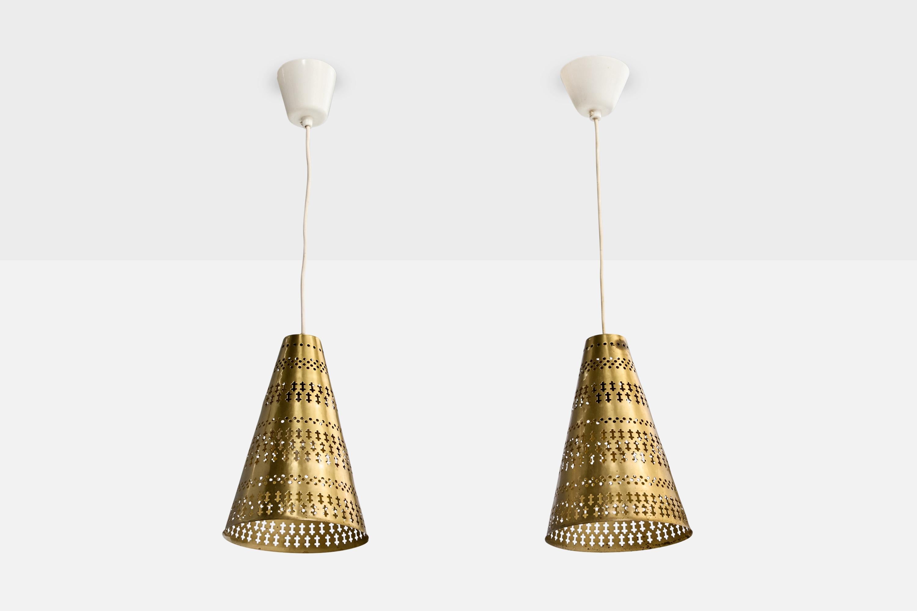 A pair of brass pendant lights designed by Hans Bergström and produced by Ateljé Lyktan, Sweden, c. 1950s.

Overall Dimensions (inches): 22.0
