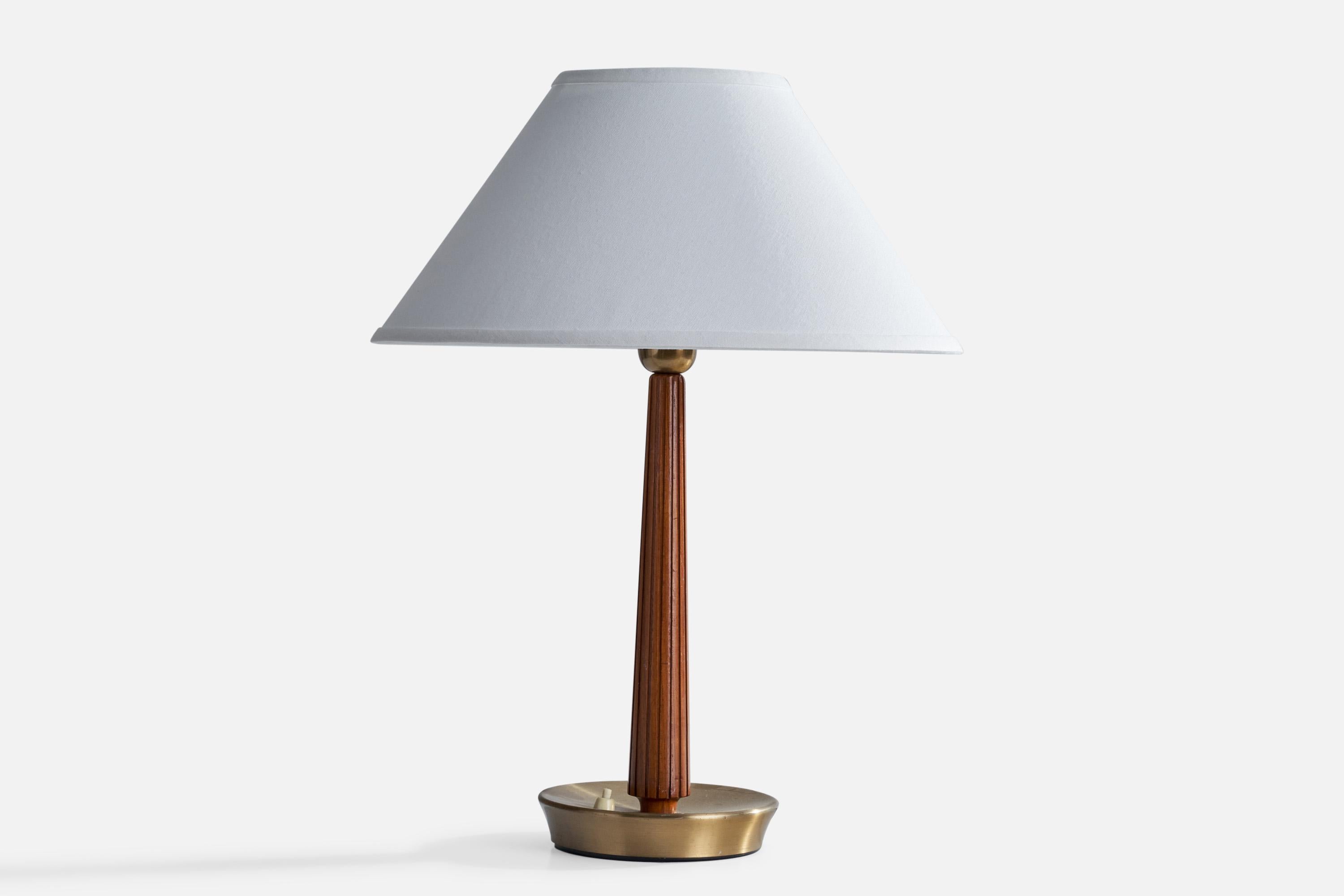A brass and elm table lamp designed by Hans Bergström and produced by ASEA, Sweden, c. 1940s.

Dimensions of Lamp (inches): 16” H x 6.75”  Diameter
Dimensions of Shade (inches): 6” Top Diameter x 16” Bottom Diameter x 9.25” H
Dimensions of Lamp with
