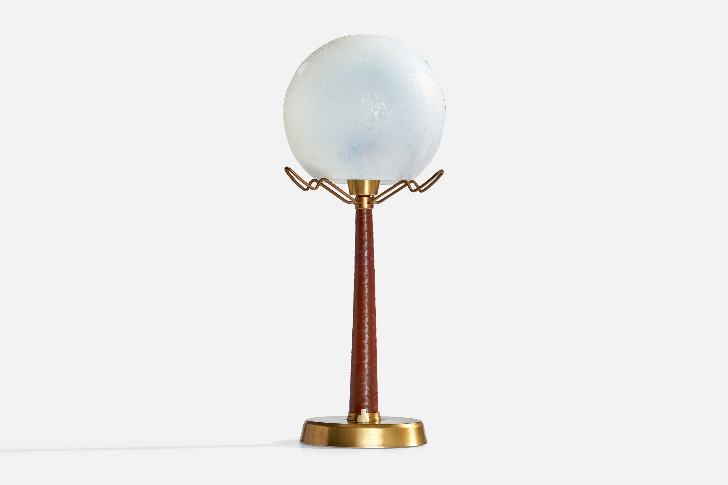 A brass, braided brown leather and frosted glass table lamp designed by Hans Bergström and produced by Ateljé Lyktan, Sweden, c. 1950s.

Dimensions of Lamp with Shade (inches):  19.5“ H x  9“ Diameter

Bulb Specifications: E-26 

Number of Sockets
