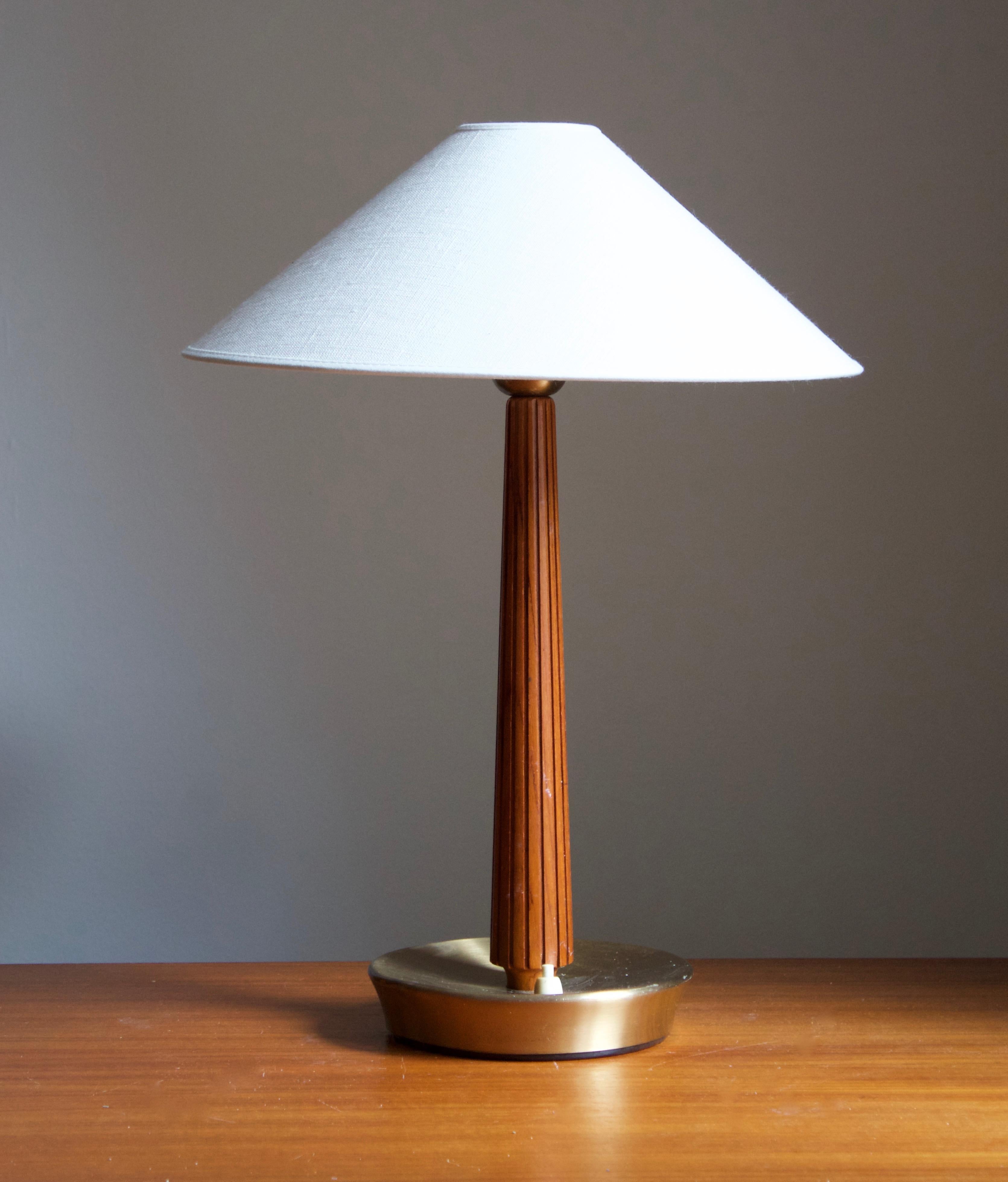 A table lamp / desk light. Designed by Swedish Hans Bergström. Produced by ASEA, Sweden, 1950s. Stamped.

Stated dimensions exclude lampshades. Height includes sockets. Sold without lampshade.