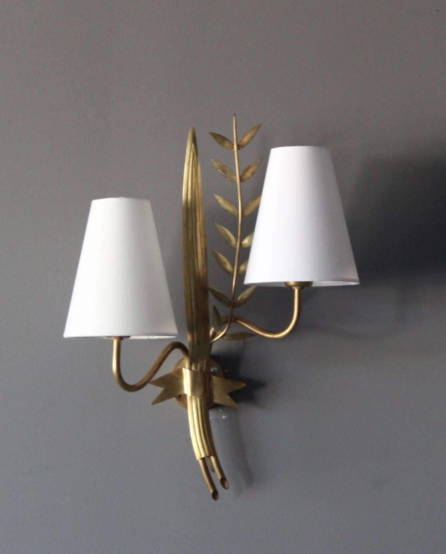 A wall light / sconce. Designed by Swedish Hans Bergström. Produced by his own firm Ateljé Lyktan, Sweden, 1940s.

Stated dimensions include lampshades.

Other designers of the period include Paavo Tynell, Hans Agne Jacobsson, Alvar Aalto, Josef