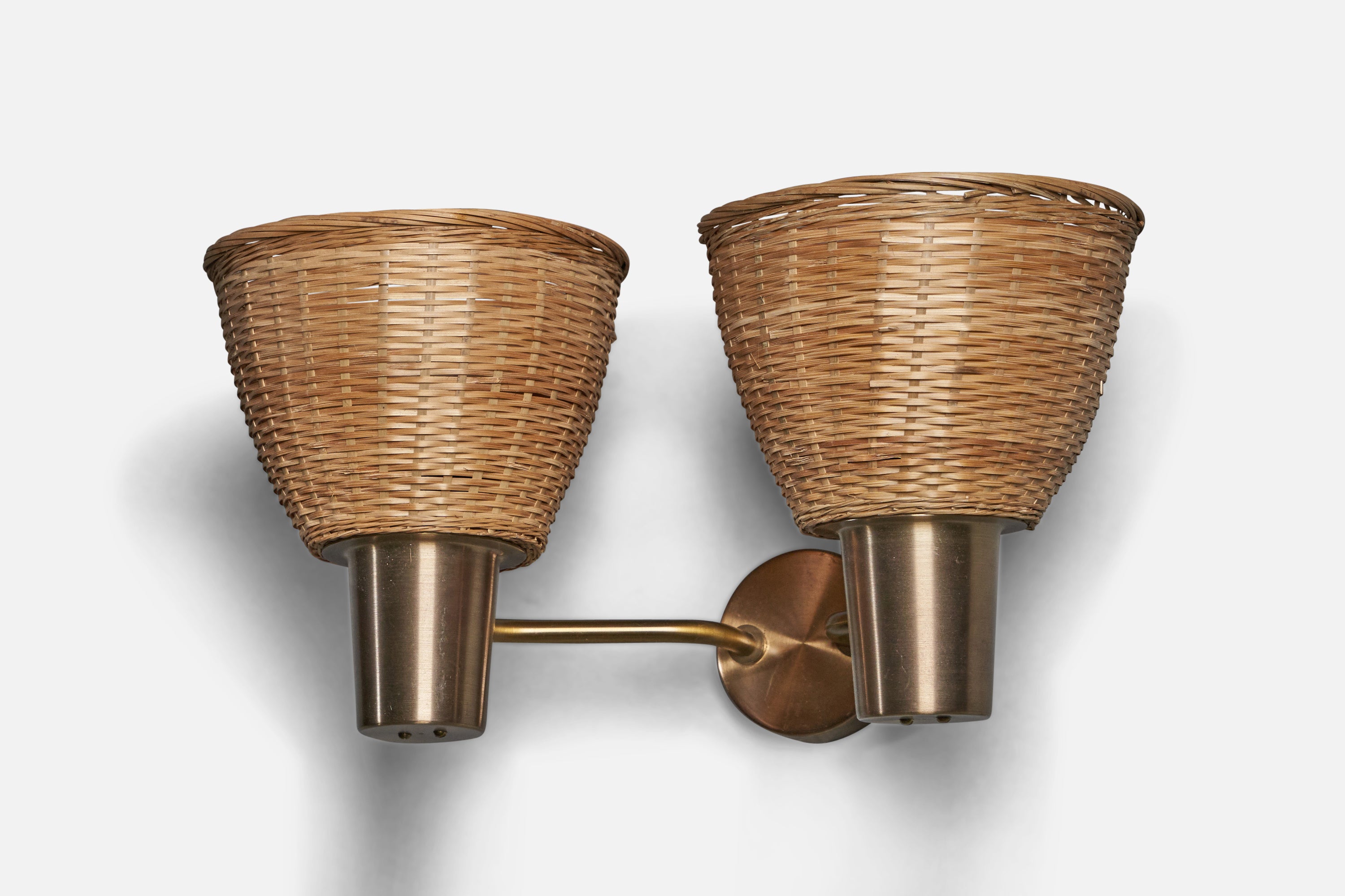 A two-armed brass and rattan wall light designed by Hans Bergström and produced by ASEA, Sweden, c. 1950s.

Overall Dimensions (inches): 8