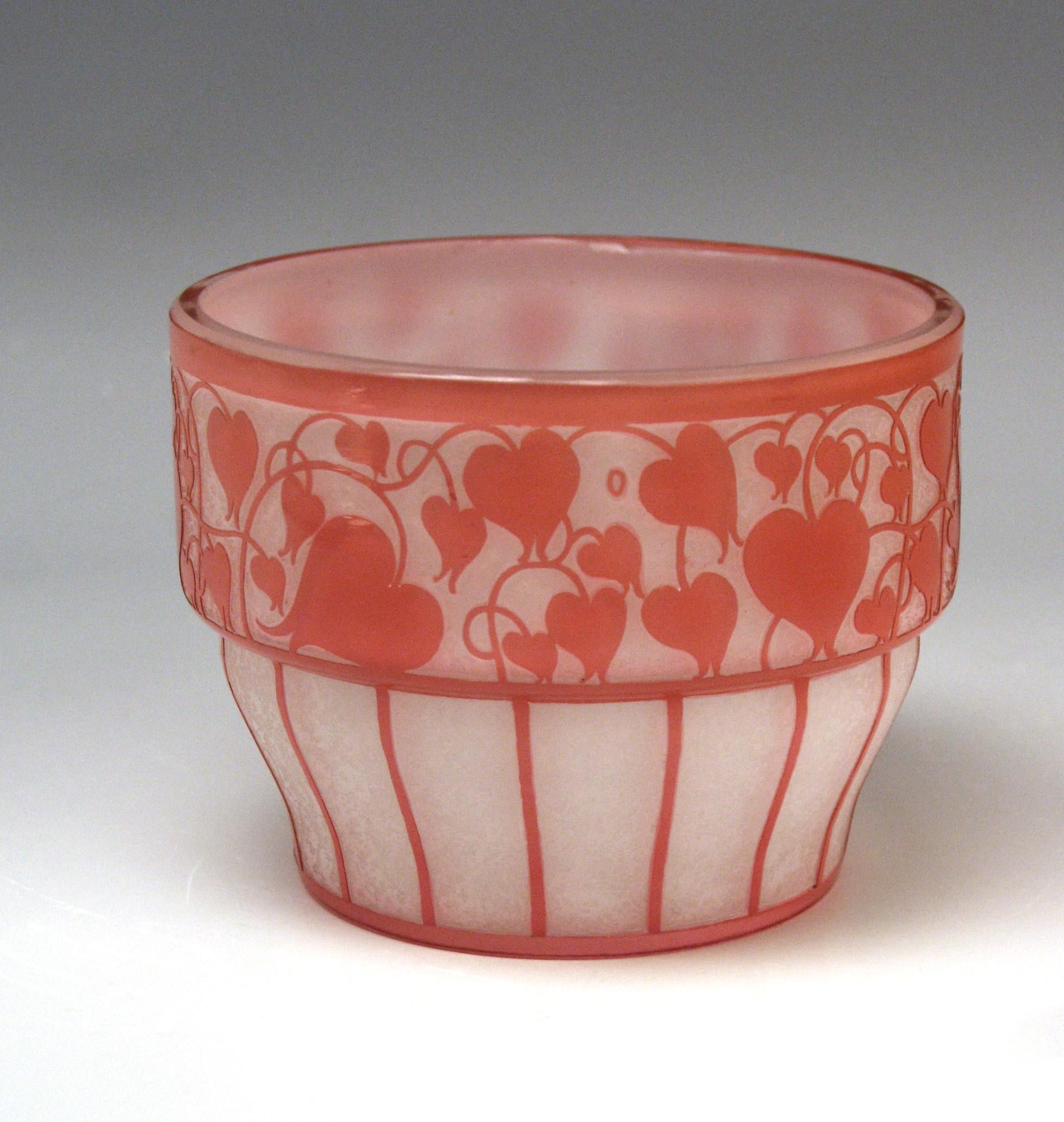 Loetz bowl opaline glass with salmon pink designed by Hans Bolek, (1890-1978):
Bolek was one of the founders of the so-said 'Österreichischer Werkbund' in 1914, he was working together with Josef Hoffmann during the period