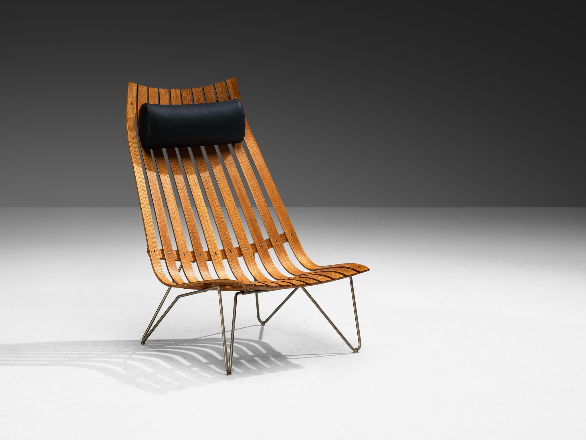 Hans Brattrud for Hove Møbler, lounge chair model 'Scandia' in teak, metal, Norway, circa 1957

This chair was part of the Scandia series, designed by Norwegian designer Hans Brattrud and produced by Hove Møbler. The chair is executed in bent teak