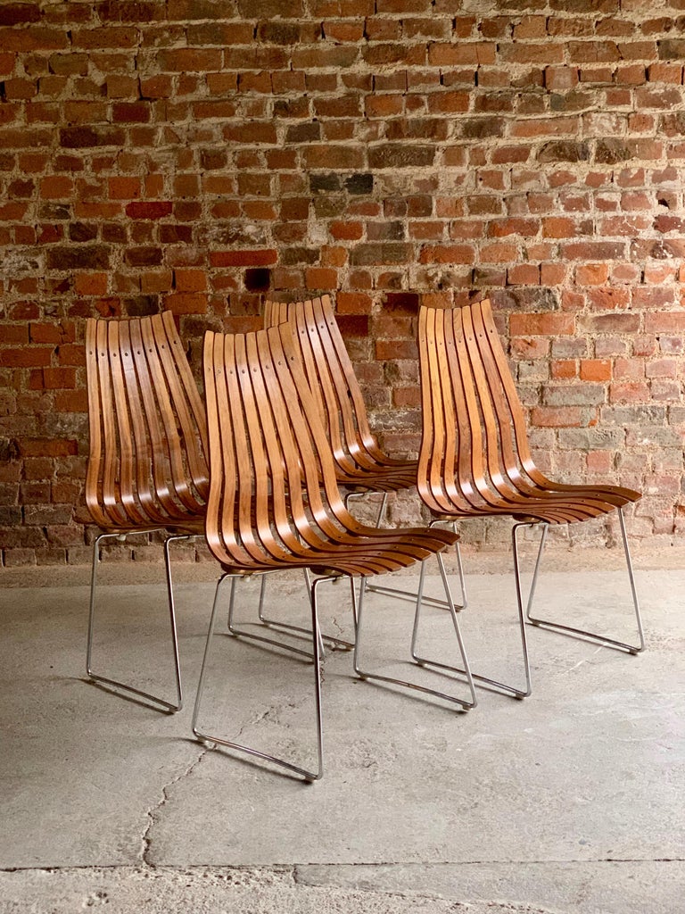 Hans Brattrud rosewood Scandia dining chairs by Hove Mobler, set of four, circa 1965

A stunning set of four Hove Mobler ‘Scandia’ rosewood dining chairs, designed by Hans Brattrud in 1957, each with laminated slats on a chrome frame (4) 

A10