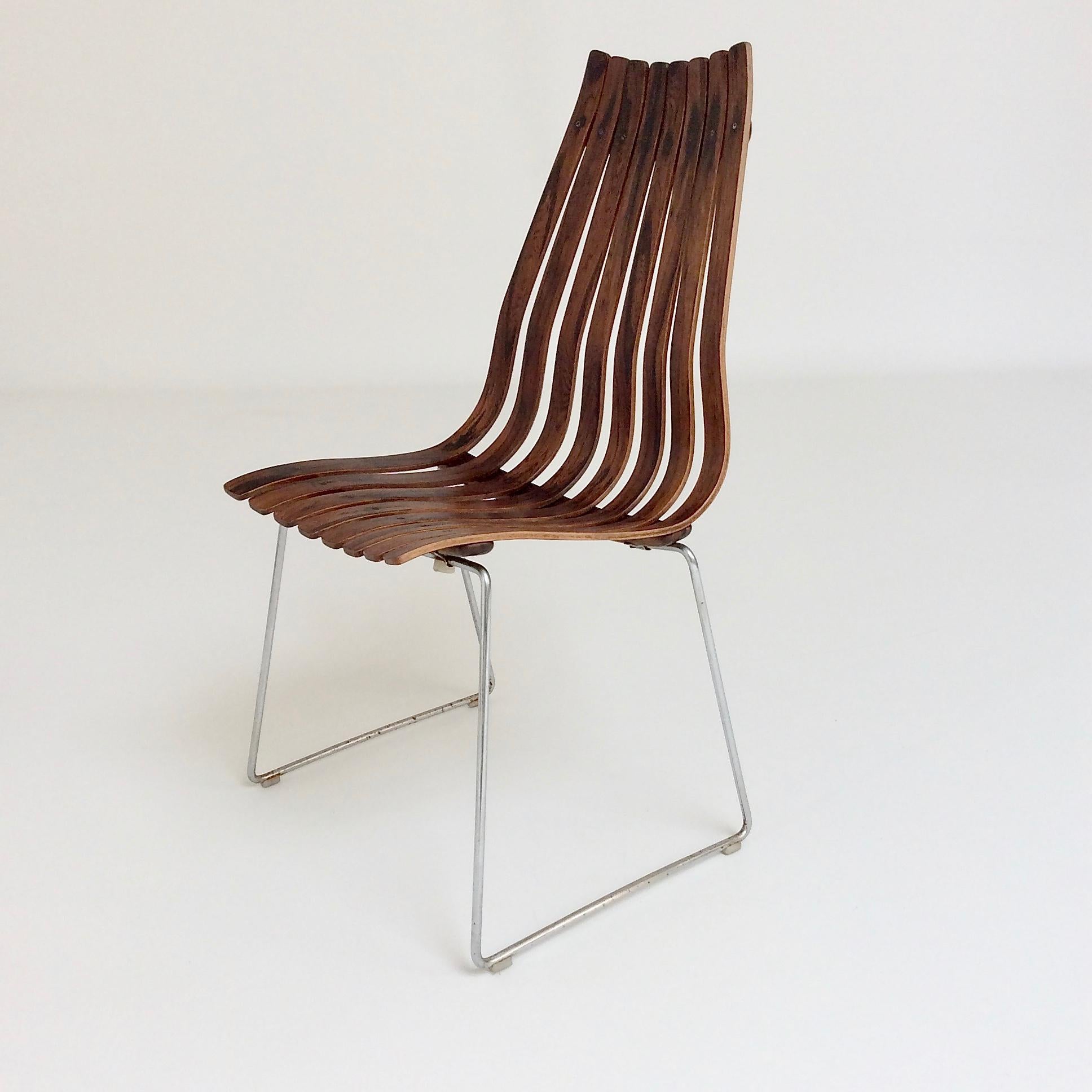 Hans Barttrud Scandia high back chair, circa 1956, Norway.
Bent rosewood slats, tubular chromed steel base.
Dimensions: 95 cm H, 56 cm W, 56 cm D, seat height 46 cm.
All purchases are covered by our Buyer Protection Guarantee.
This item can be