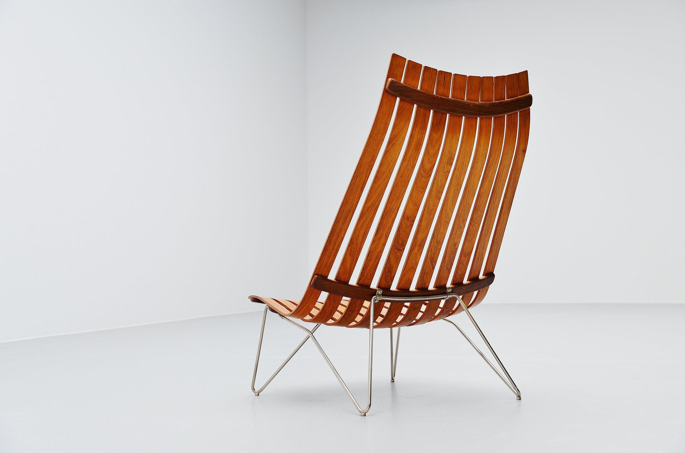 Fantastic low lounge chair model Scandia designed by Hans Brattrud and manufactured by Hove Mobler, Norway, 1957. This chair was made of several plywood veneered slats, rosewood finished and has a chrome-plated solid metal base. The chair comes from