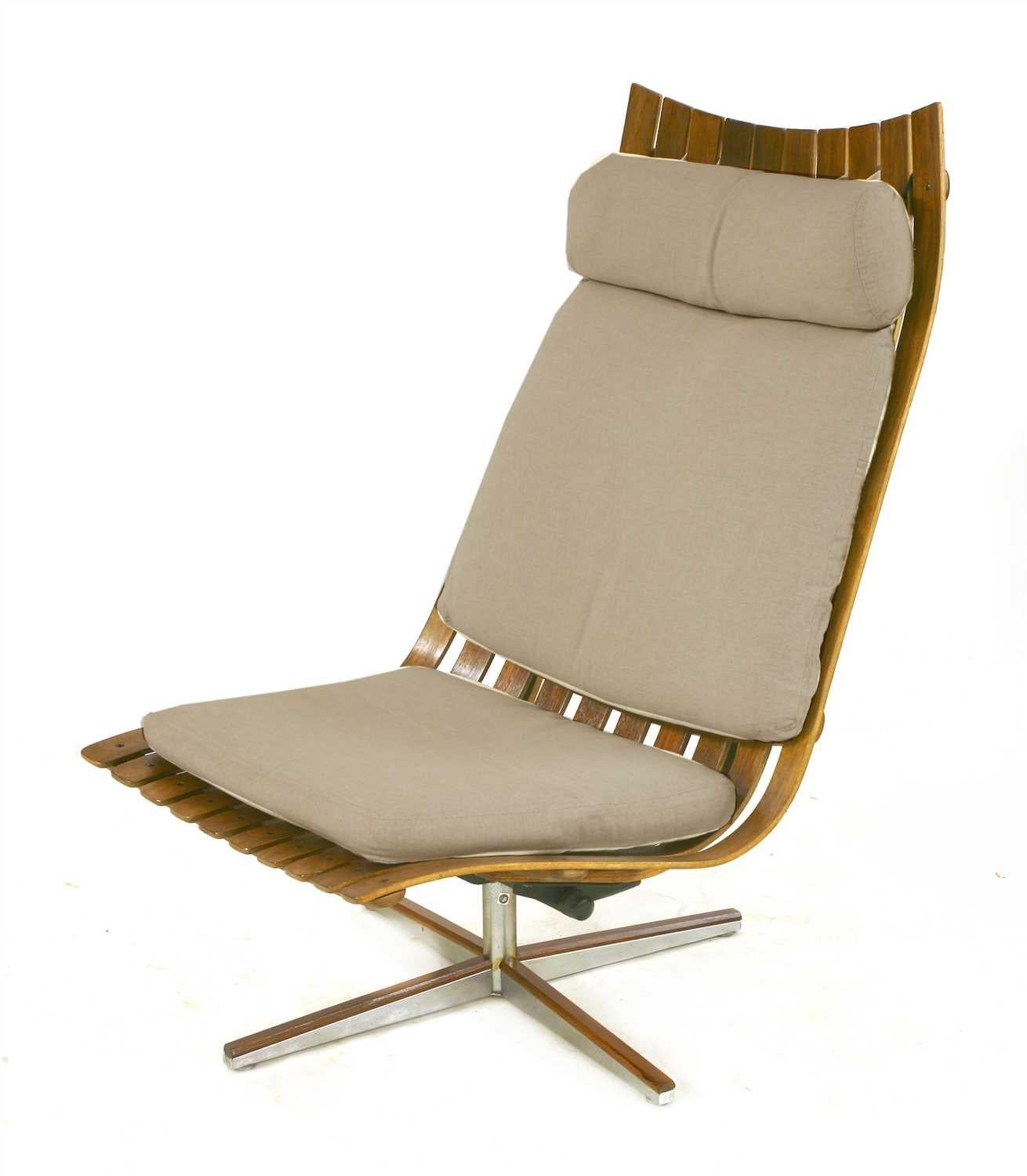 Hans Brattrud Scandia rosewood lounge chair by Georg Eknes, Norway, circa 1970

We are delighted to offer a Scandia Rio rosewood slatted lounge chair Norway circa 1970, designed by Hans Brattrud for Georg Eknes, on a revolving stand, labelled