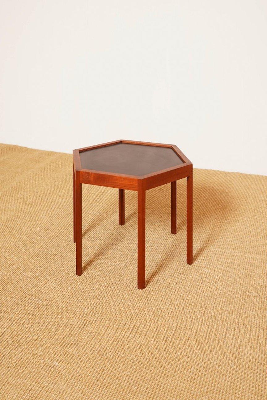 Hans C. Andersen Hexagonal side table is made of rosewood and inlay formica in great original condition.