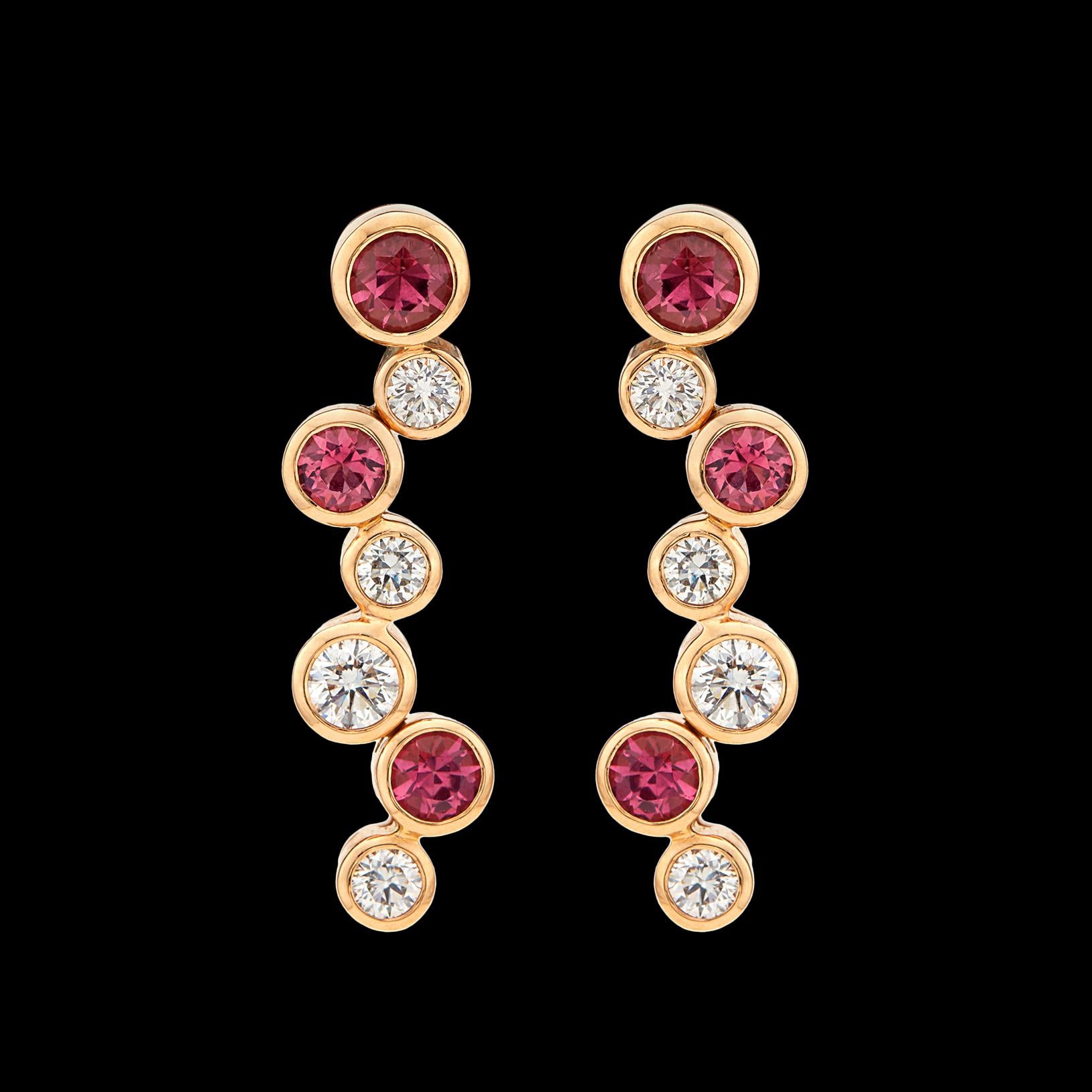 Bubbling with sparkle, these Hans Kreiger 18k rose gold earrings are designed with bezel-set 6 round pink tourmalines weighing 0.89 carat and 8 round brilliant-cut diamonds, weighing in total 1.08 carats, G/SI quality. The earrings weigh 8.0 grams