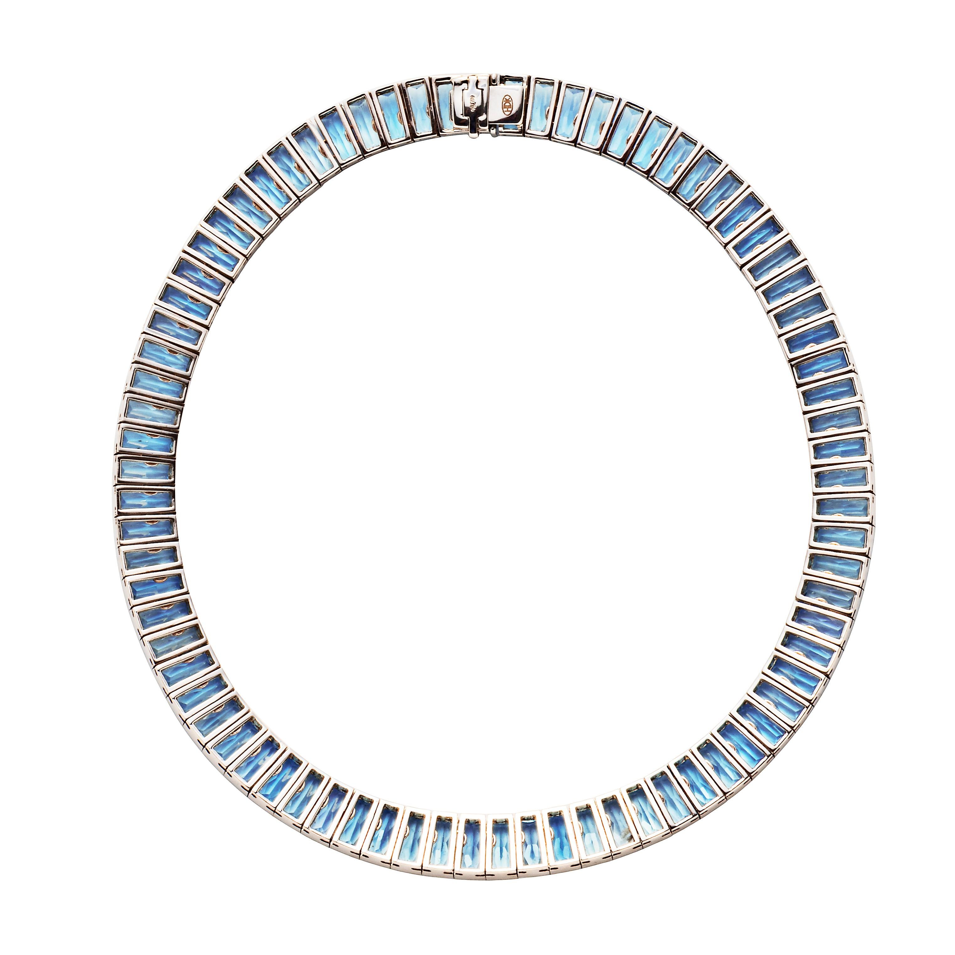 Set with a cascade of 78 fancy-cut blue topazes that weigh a staggering 200 carats, this refined necklace comes from the workshops of Hans D. Krieger, a German jeweler with over 300 years of history. The firm is known for their expert craftsmanship,