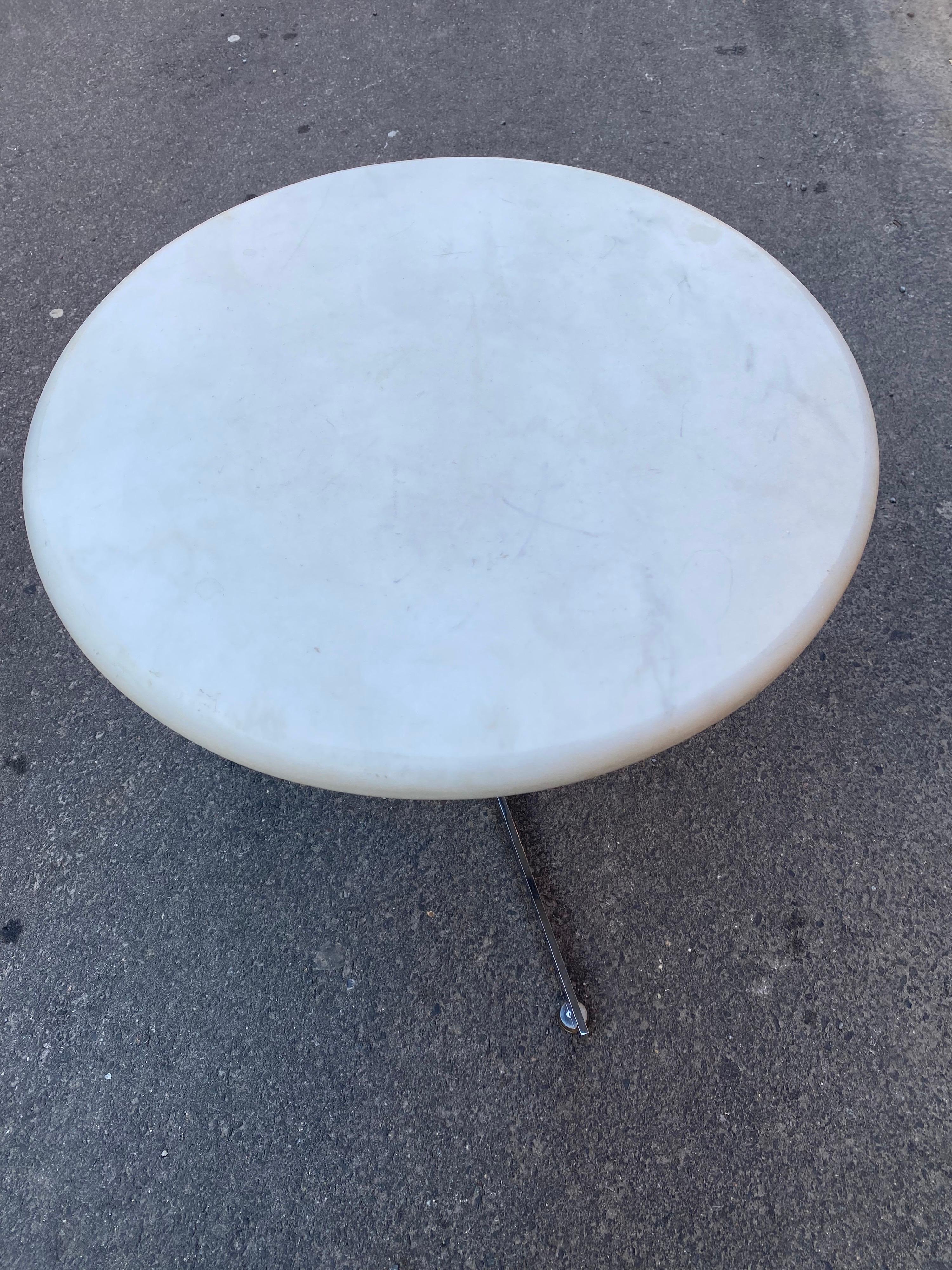Hans Eichenberger for Ernst Ries & Sohn Round Heavy Marble Side Table with a Chrome Base. Base is made up of 3 L shaped Chrome pieces that attach to form 3 legs. Each leg has a round chrome foot. Unique Simple Design! Table sits rock solid! White
