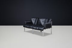 Hans Eichenberger pour Girsberger, fauteuil en cuir noir, Suisse, 1970