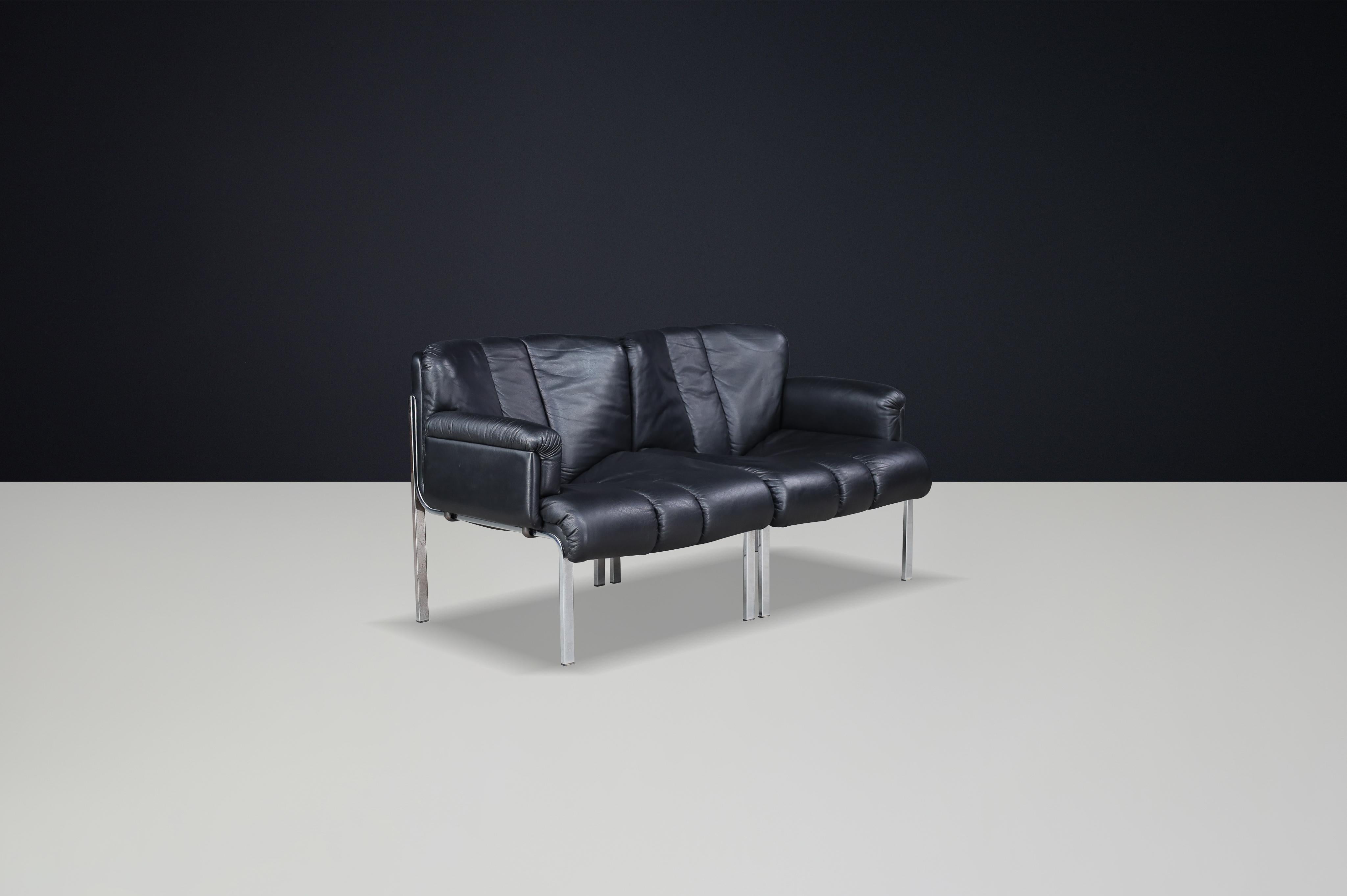 Mid-Century Modern Hans Eichenberger pour Girsberger, fauteuil en cuir noir, Suisse, 1970 en vente