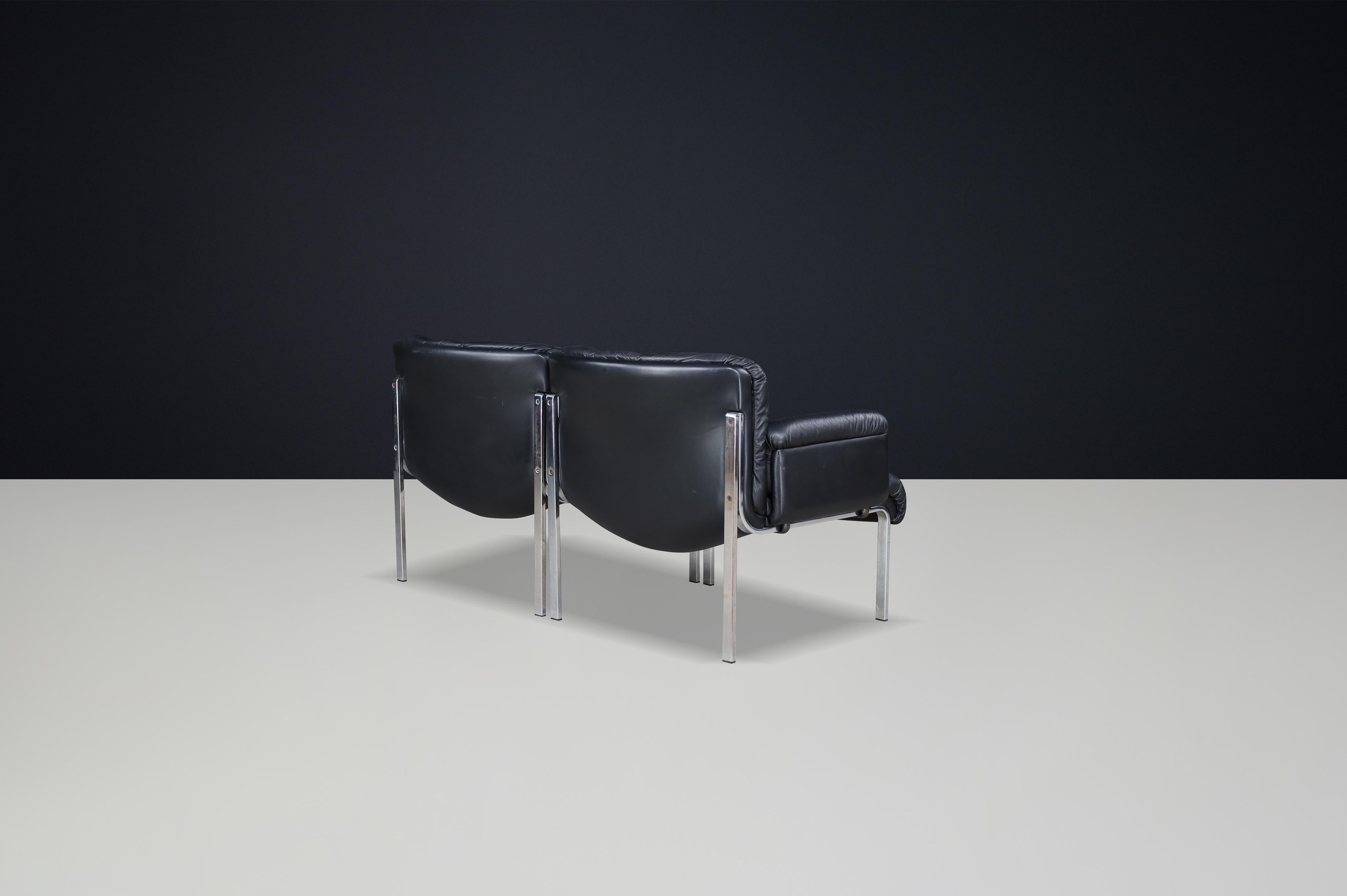 Cuir Hans Eichenberger pour Girsberger, fauteuil en cuir noir, Suisse, 1970 en vente