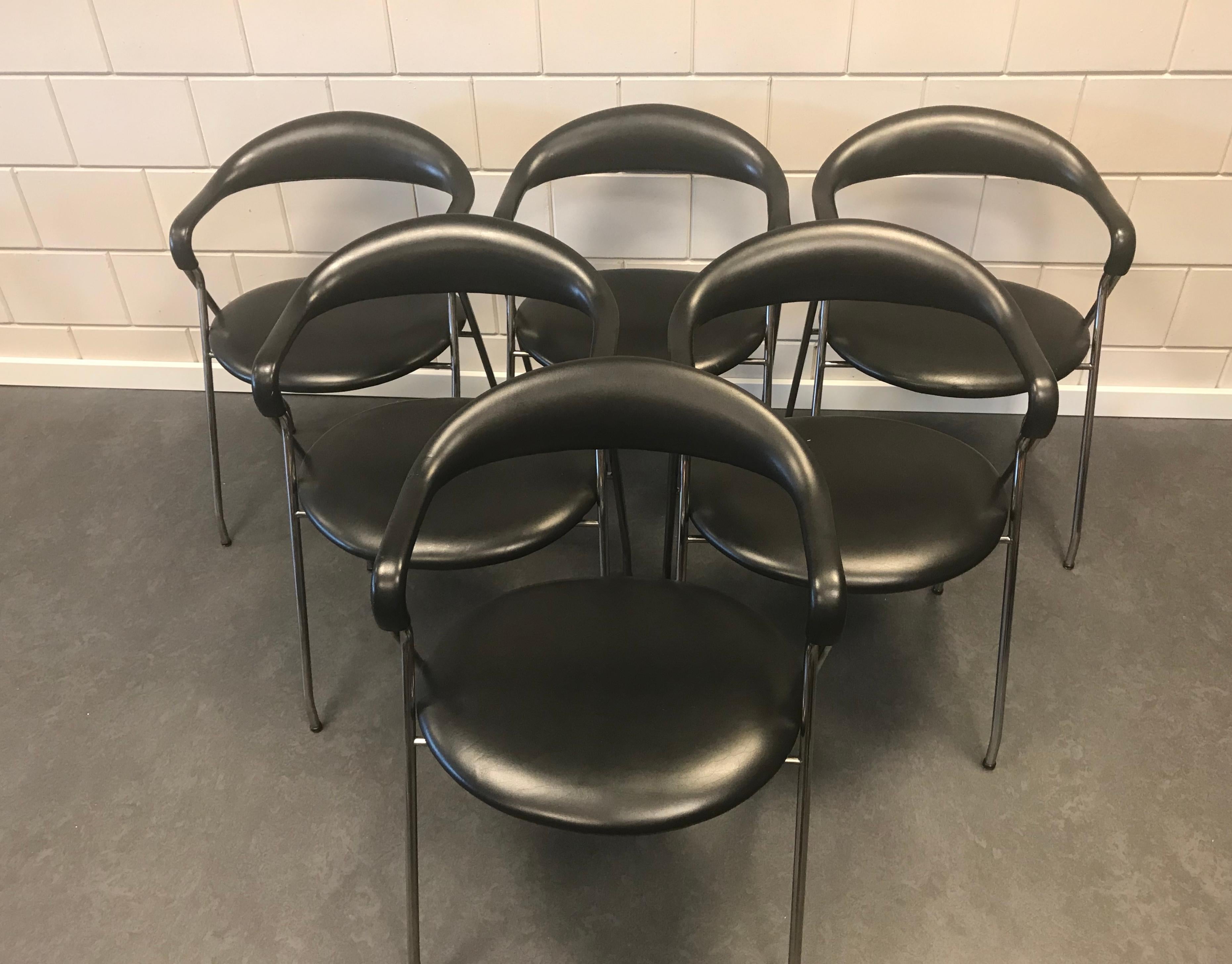 6 chairs available from Hans Eichenberger, Switzerland born 1926.
The chairs, Saffa HE 103 are made for Dietiker, Switzerland in 1955. 

Legs from chromed tubular steel with leather seating and backrest. The design may be minimalistic, but they