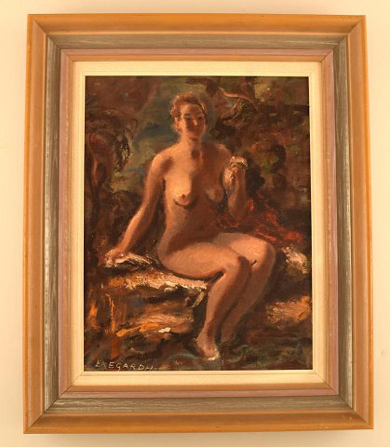 Hans Ekegardh (b. 1881, d.1962), Swedish artist. Oil on canvas. Seated nude model, landscape in the background. 1940s.
In very good condition.
Signed.
The canvas measures: 34 x 26 cm.
The frame measures: 7 cm.