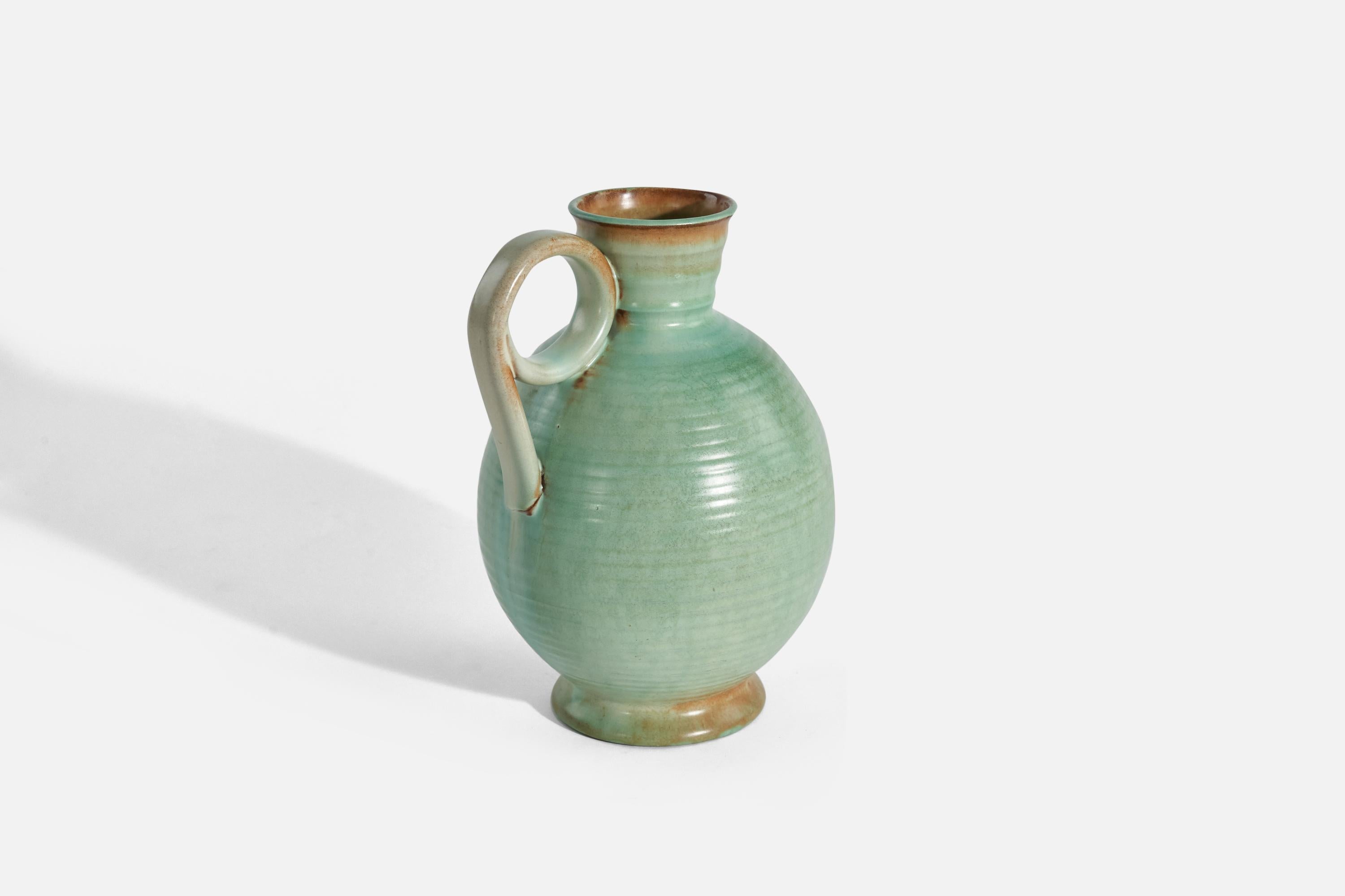 A green, glazed stoneware vase designed by Hans Erik Rosenkvist and produced by A&J Höganäs, Sweden, c. 1930s.

