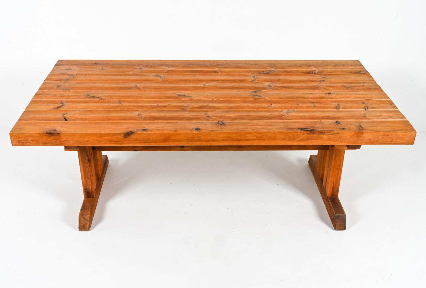 Bring rustic Postmodern charm to your home with this fabulous dining table from the sought-after 