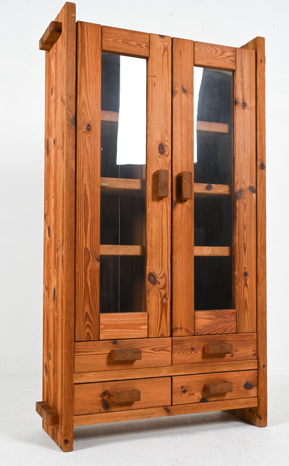Bring rustic Postmodern charm to your home with this fabulous glazed cabinet from the sought-after 