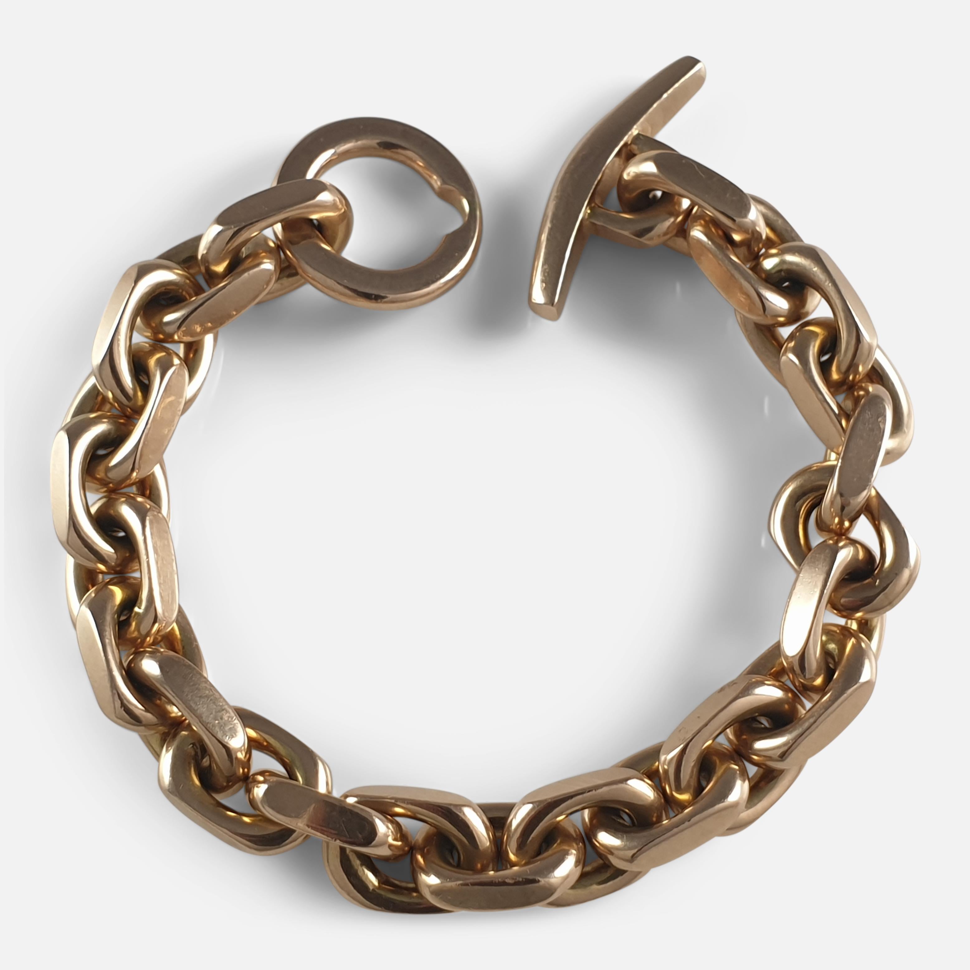 A Danish 14k yellow gold marine anchor link bracelet by Hans Hansen.  The bracelet is stamped with the 'Hans Hansen' facsimile mark, '585', and 'Denmark'. The bracelet is UK hallmarked, stamped '585' to denote 14 karat (carat) gold. The bracelet can