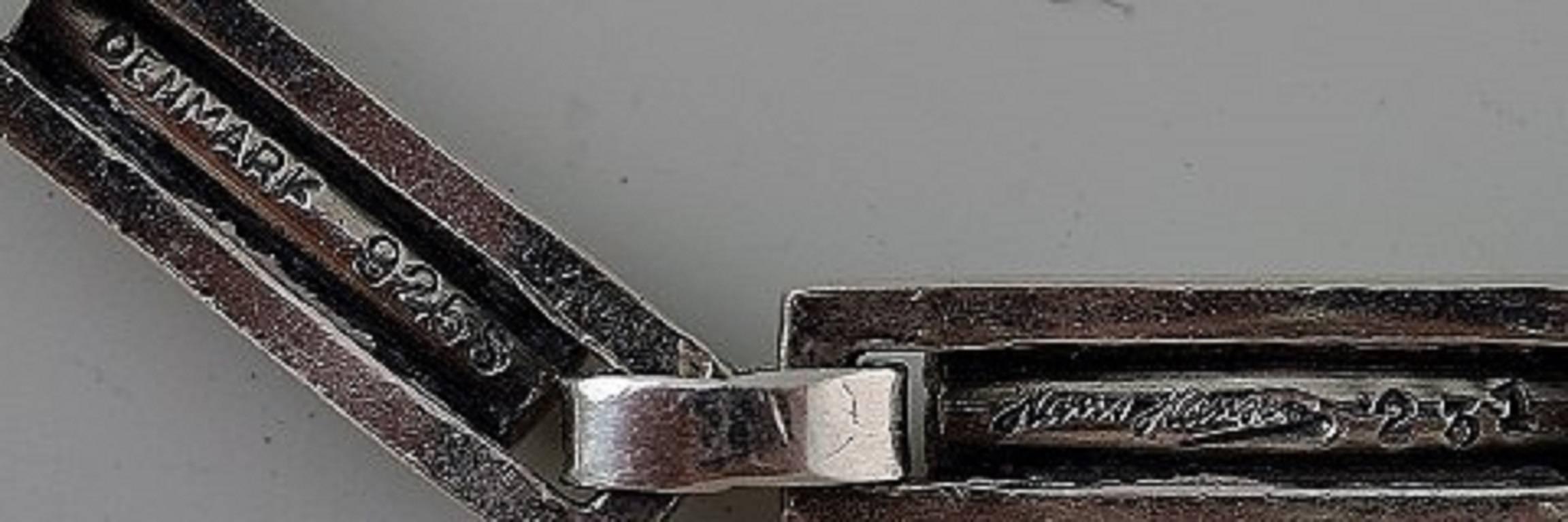 Hans Hansen bracelet of sterling silver.
Marked Hans Hansen 925S Denmark.
Length 18-19 cm.
In perfect condition.
