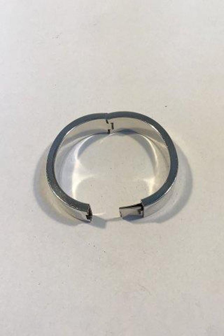 Hans Hansen Sterling Silver Arm Ring.

Measures inside 5.2 cm x 5.9 cm(2.04 in x 2.32 in) Weight 68.3 gr /2.20 oz.