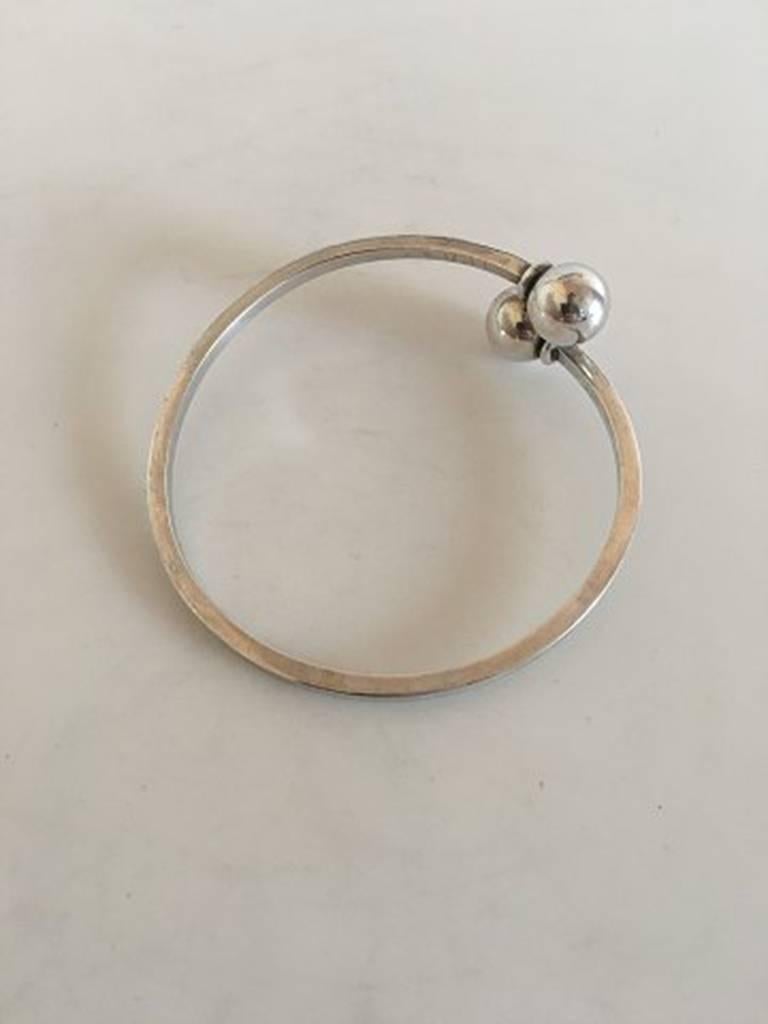 Hans Hansen Sterling Silver Bangle Bracelet #207. The arm ring is expandable at the top, so it is easy to put on. Measures 6.5 cm / 2 9/16 in. inner diameter. Weighs 25 g / 0.90 oz