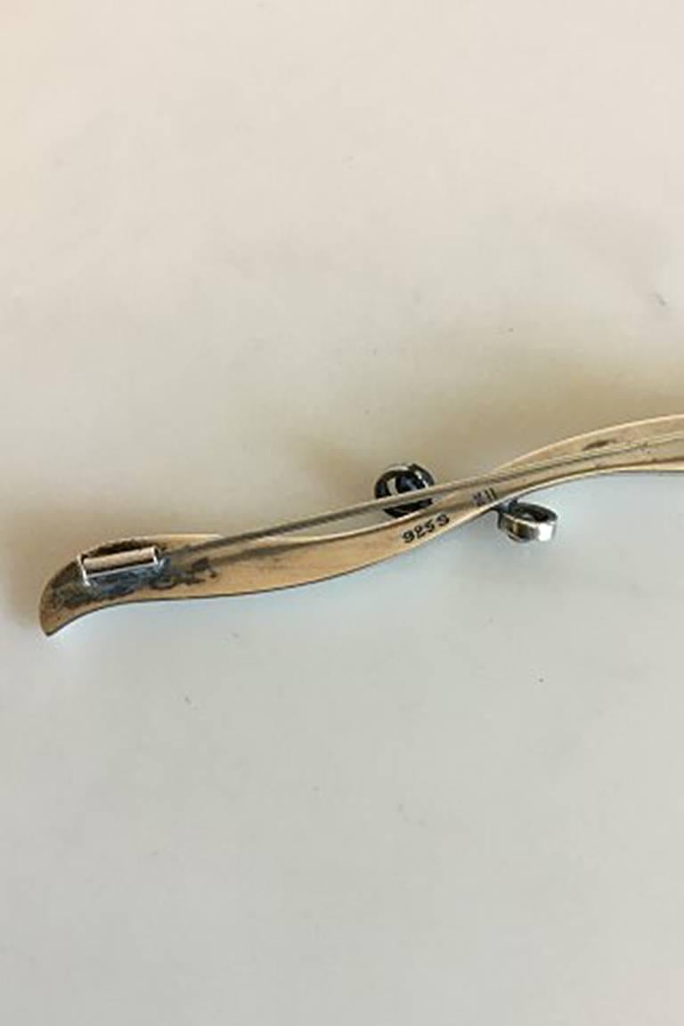 Hans Hansen Sterling Silver Brooch Designed by Karl Gustav Hansen. Measures 8.1 cm / 3 3/16 in. and is in good condition. Weighs 10.1 g / 0.35 oz.