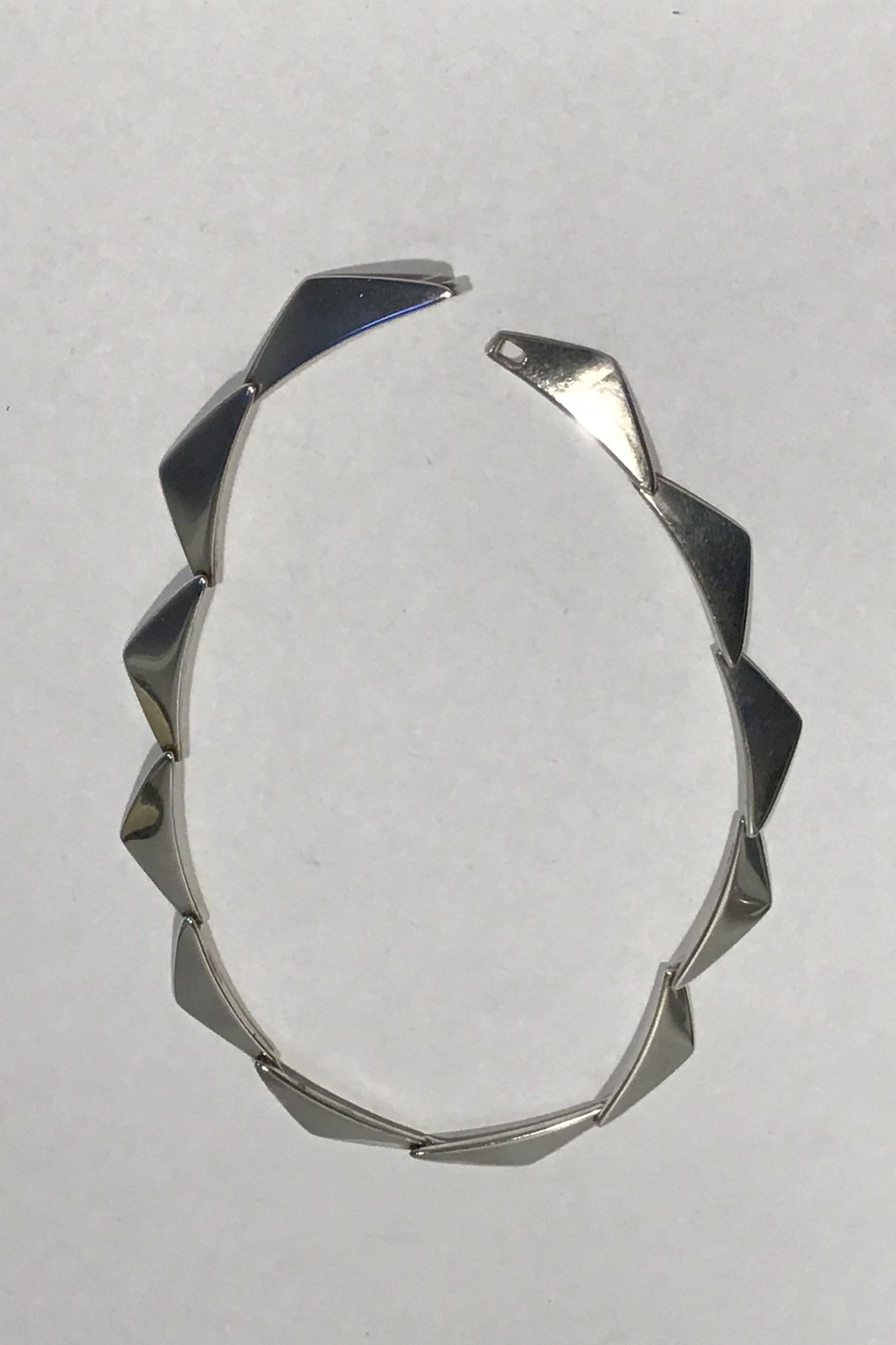 Hans Hansen Sterling Silver Necklace No 315. 
Measures 36 cm(14 11/64 in)
Weight 30.7 gr(1.08 oz)
(12 Links)