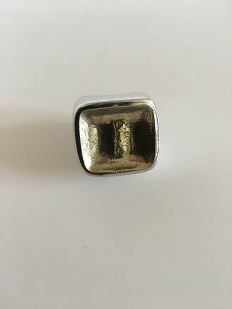Hans Hansen Sterling Silver Ring with Gilded Top. Size 53 (US Size 6½). Weighs 25 grams (0.80 oz). Measures 2 x 2 cm (0 25/32 in x 0 25/32 in)