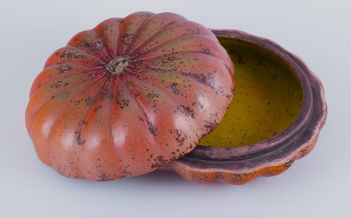 Pre-owned goods are exempt from import duties for U.S. customers. 
Therefore, no import tariffs will be applicable to your purchase.

Hans Hedberg, Swedish ceramicist, for Biot, France. 
Large lidded jar in the form of a pumpkin.
Crystal glaze in