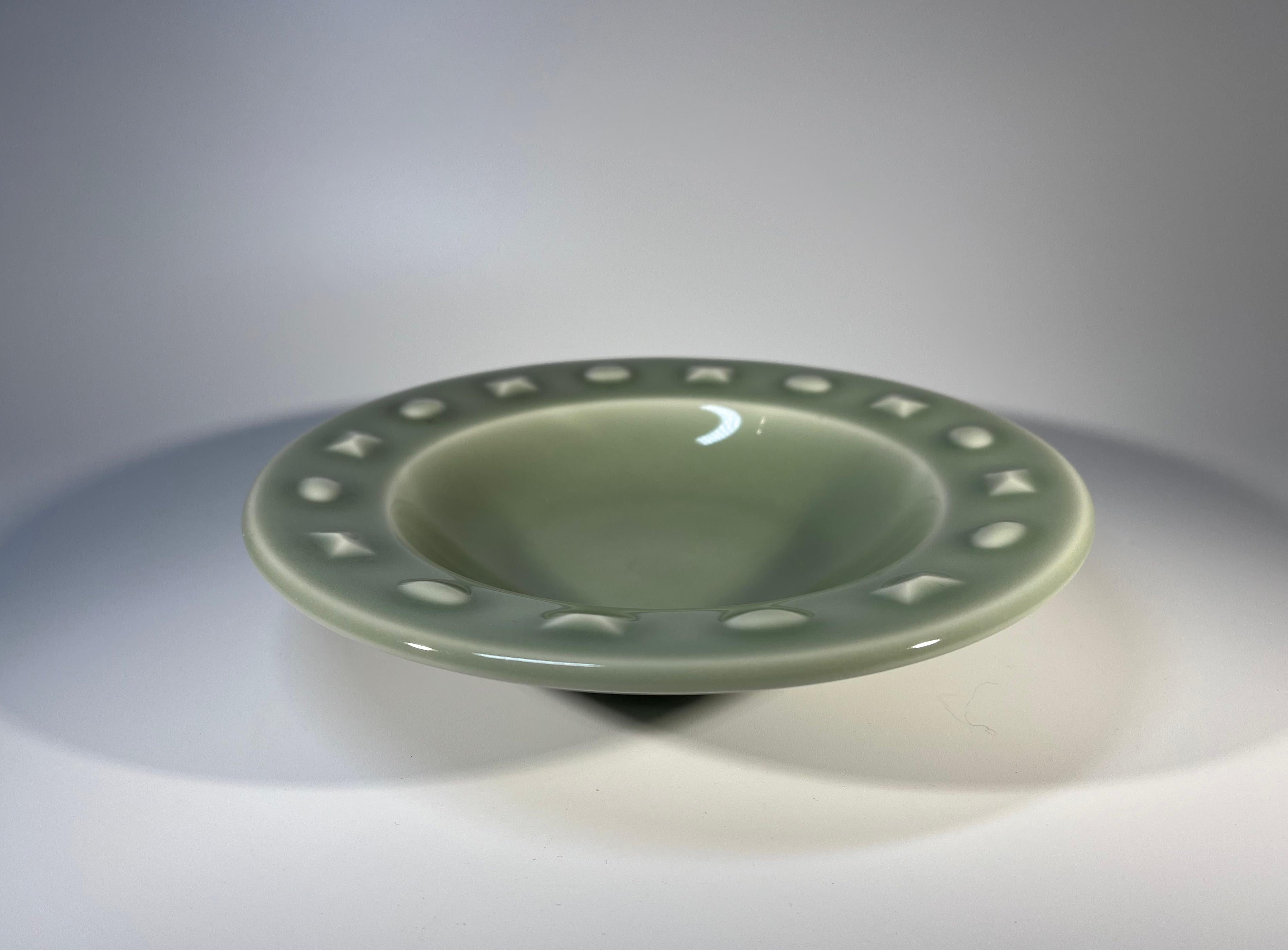 A beautiful celadon glazed dish by Hans Henrik Hansen for Royal Copenhagen 
Exemplary transparent glaze and form
Circa 1954
Stamped and numbered HHH 4397
Height 1.5 inch, Diameter 7.25 inch
In excellent condition
Wear consistent with age and use