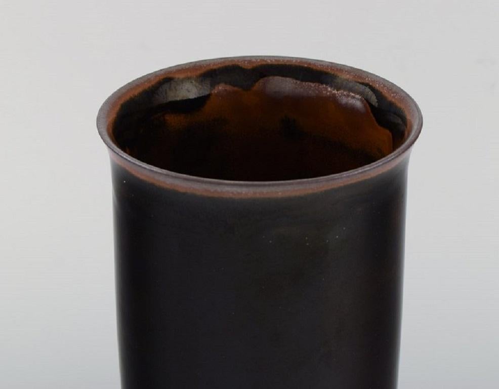 Hans Henrik Hansen for Royal Copenhagen. Vase in glazed stoneware. Beautiful glaze in brown shades. 1930/40's.
Measures: 19.5 x 12.3 cm.
In excellent condition.
Stamped.
1st factory quality.