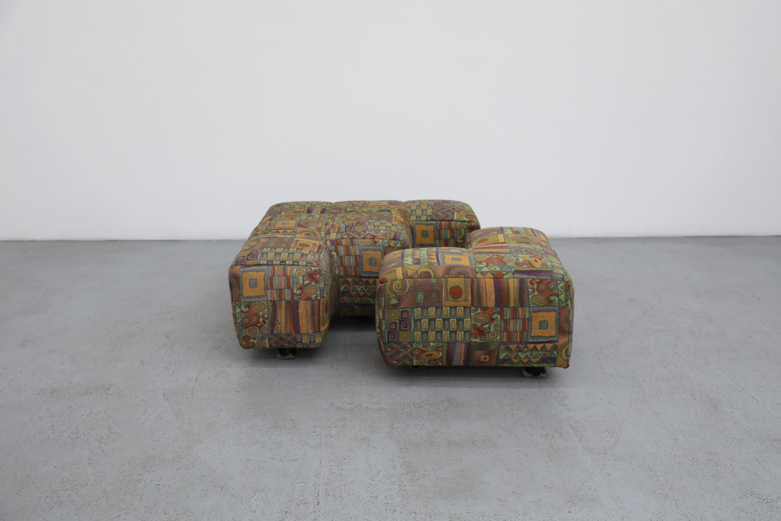 Hans Hopfer's innovative Castell modular ottoman system showcases the designer's revolutionary approach to functional furniture for Wiener Werkstätte. These two interlocking pieces feature the signature puzzle-piece design that made the Castell